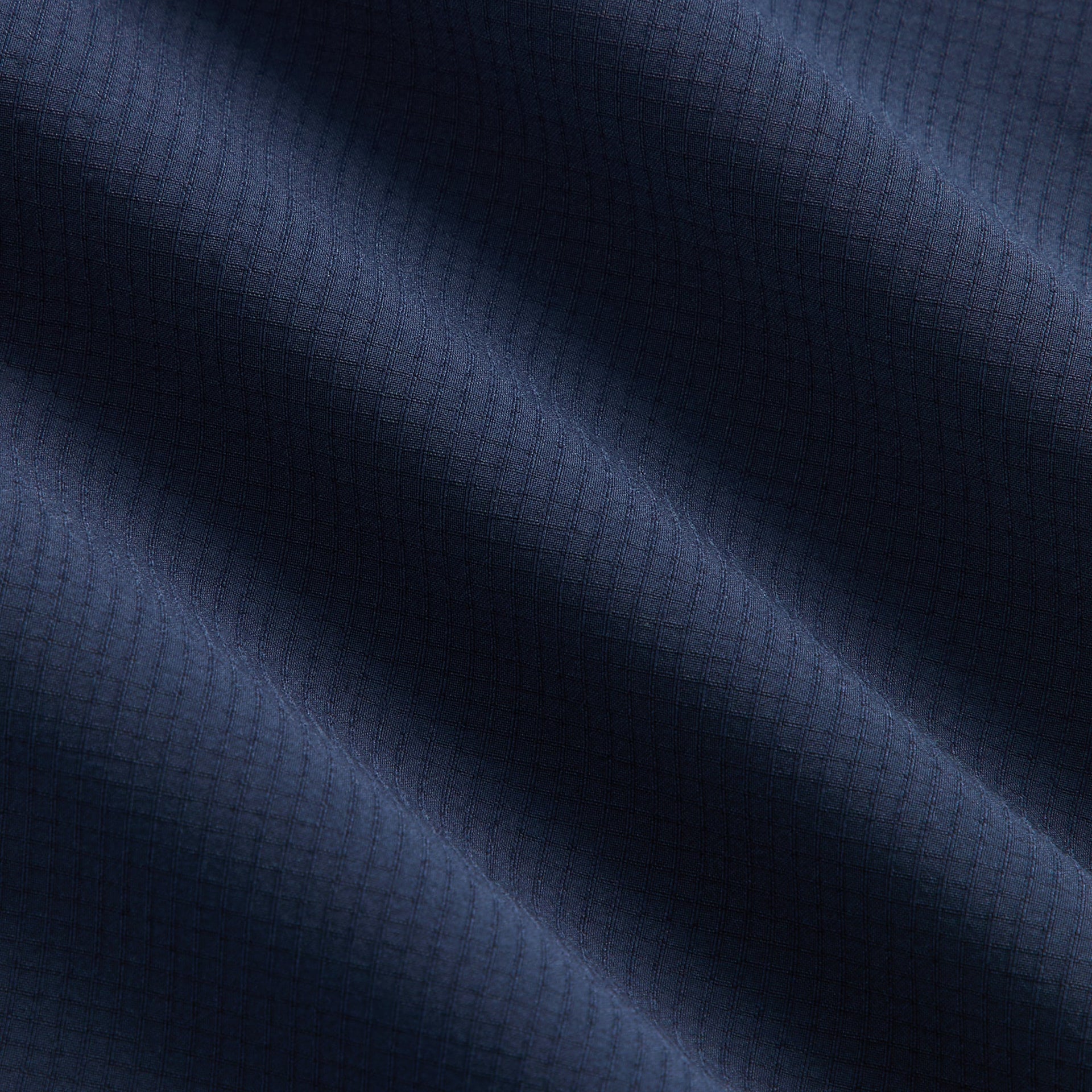 Kith Kids Lora Windbreaker Jacket close-up of navy ripstop fabric texture