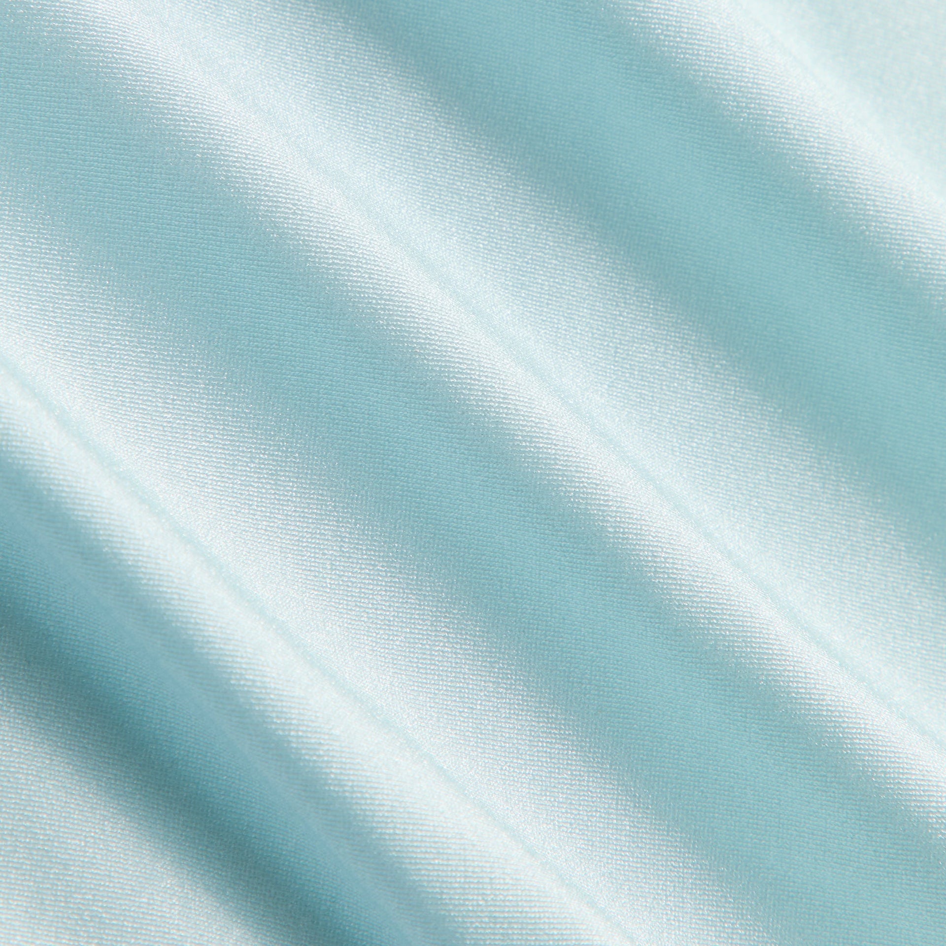 Kith Kids Active Logo Tee close-up of light blue stretch performance fabric texture