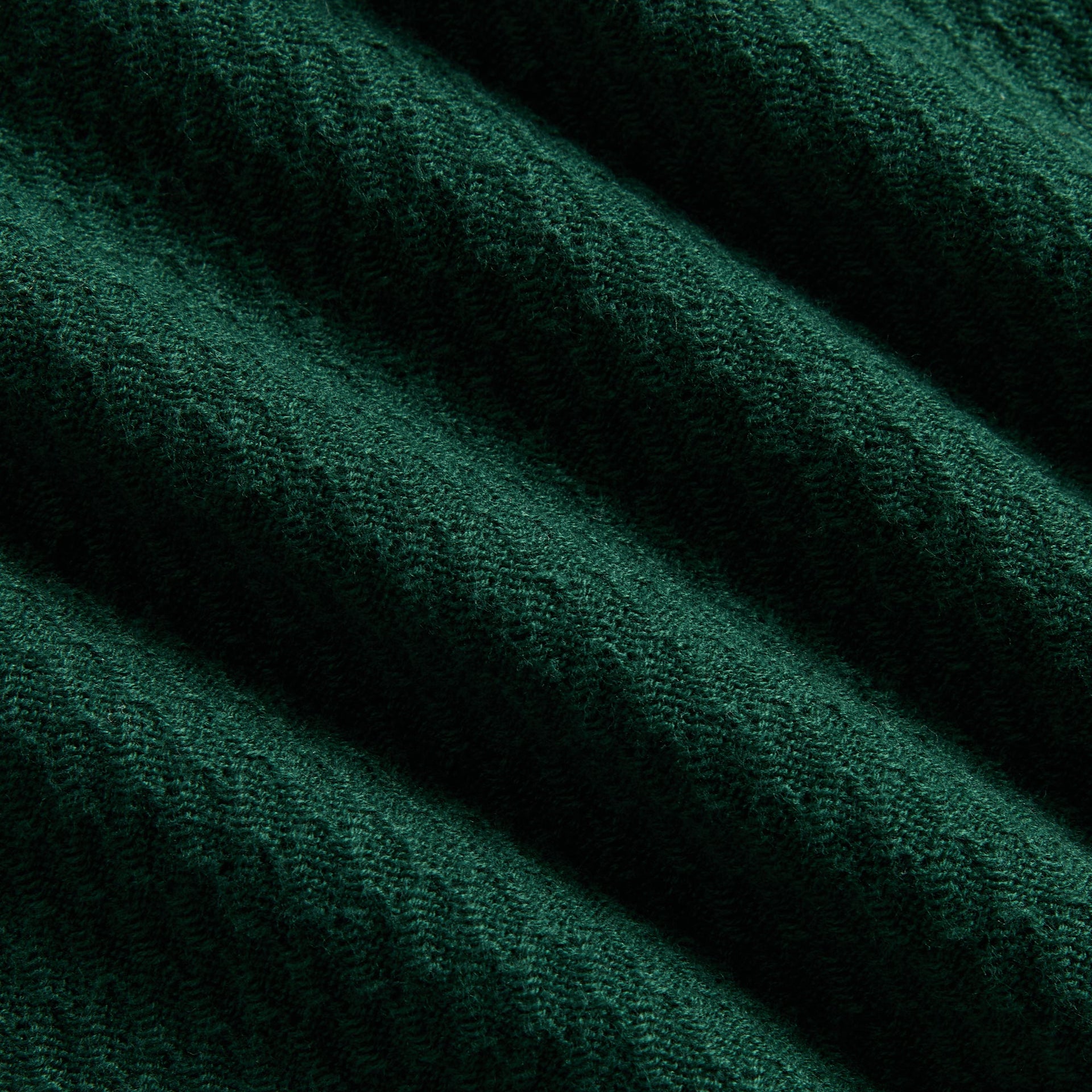 Kith Kids Tilden Long Sleeve Polo, close-up of dark green textured knit fabric