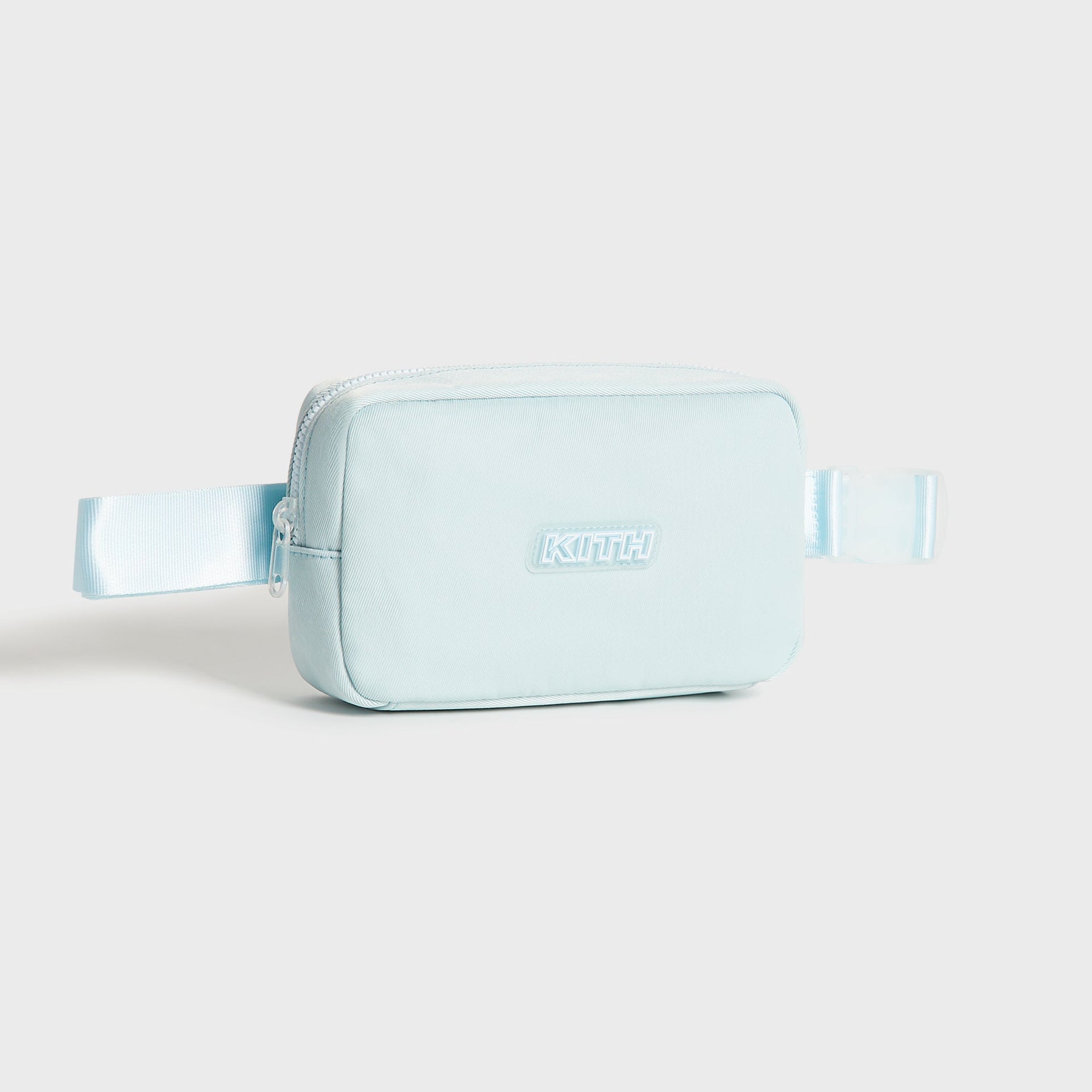 Kith Kids Active belt bag in light blue Surry, three-quarter angle view showing depth and KITH logo patch