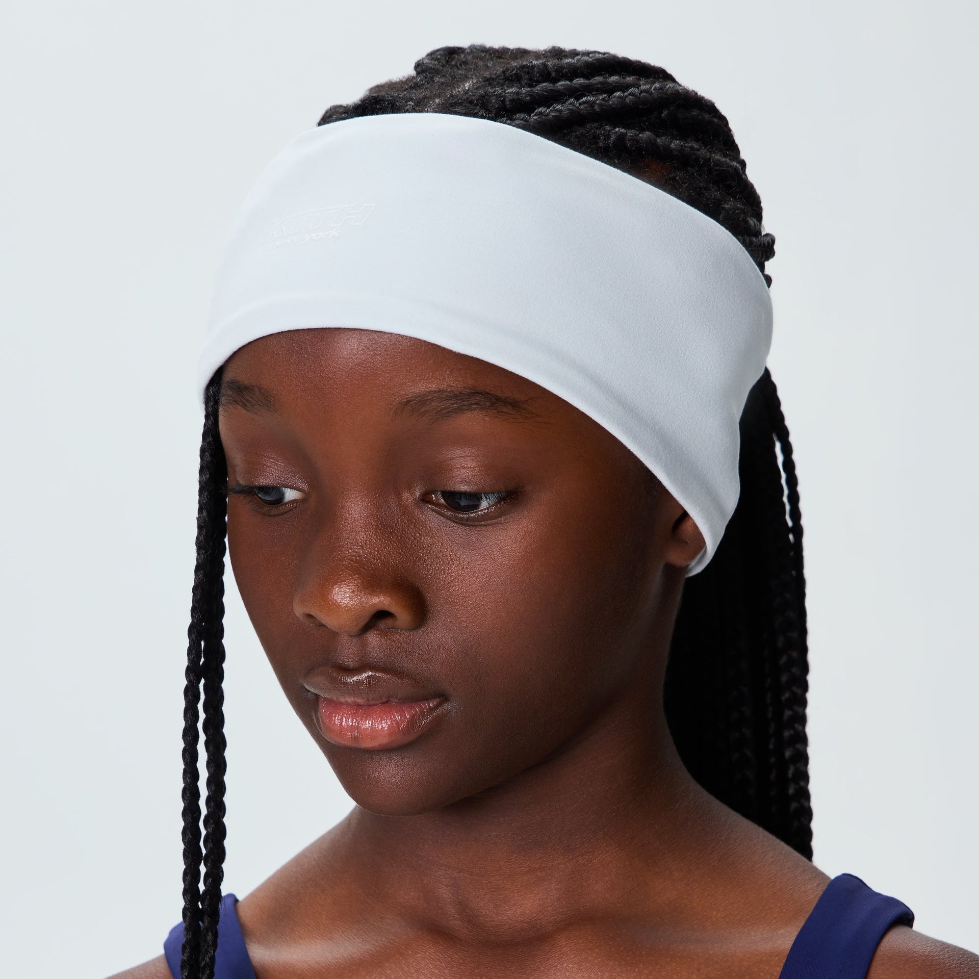 Kith Kids Active Headband in Surry pale mint worn on model, front view of sport sweatband