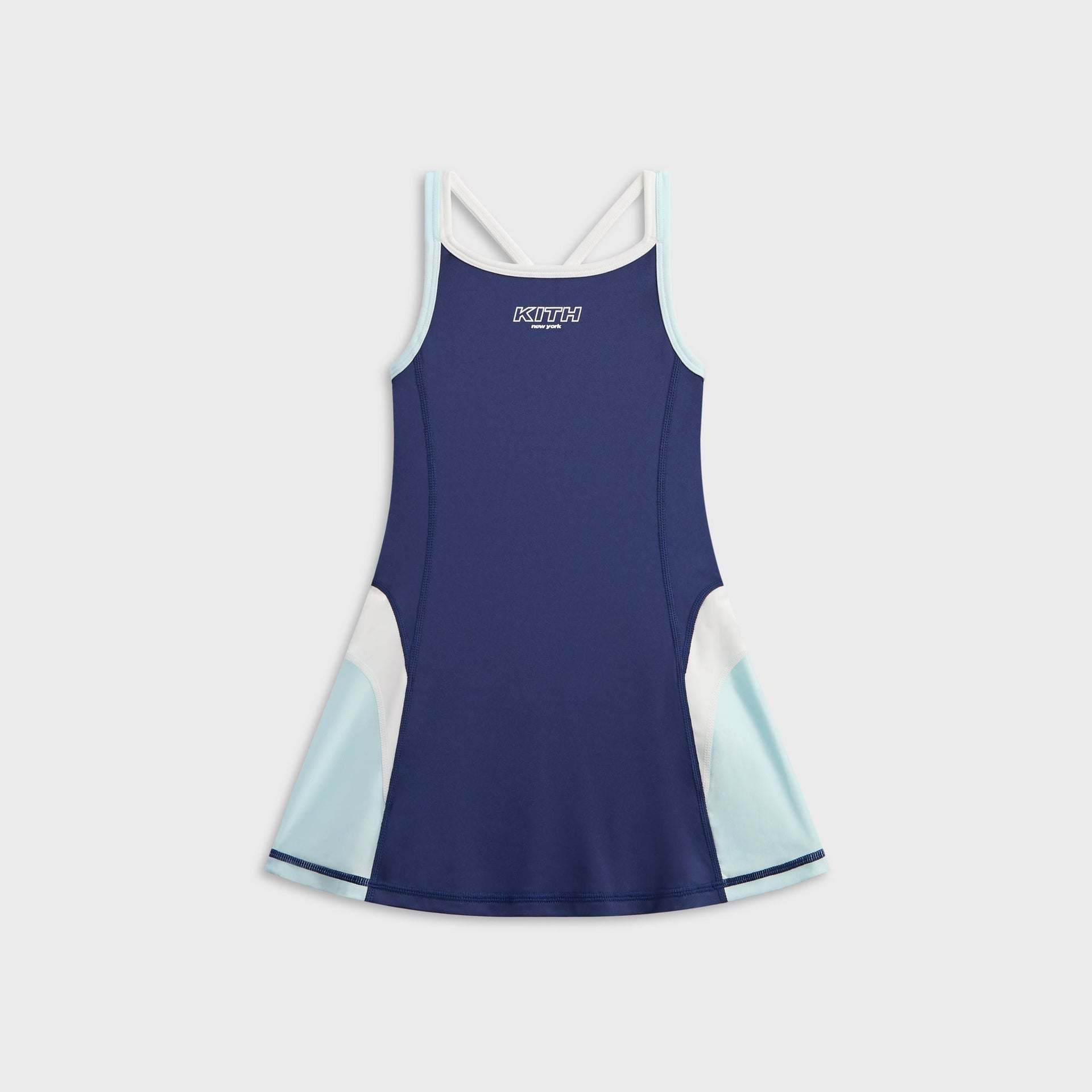 Kith Kids Active Skye Romper Dress in Nocturnal navy, front flat lay with light blue and white color-blocked side panels and KITH logo
