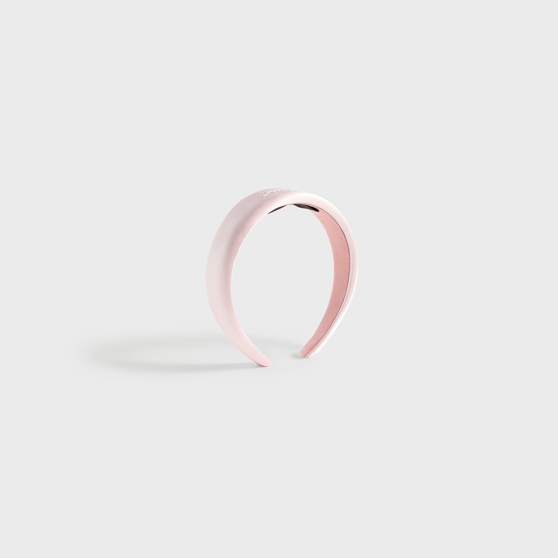 Kith Kids Satin Headband in Bloom pink, side profile view of padded satin headband