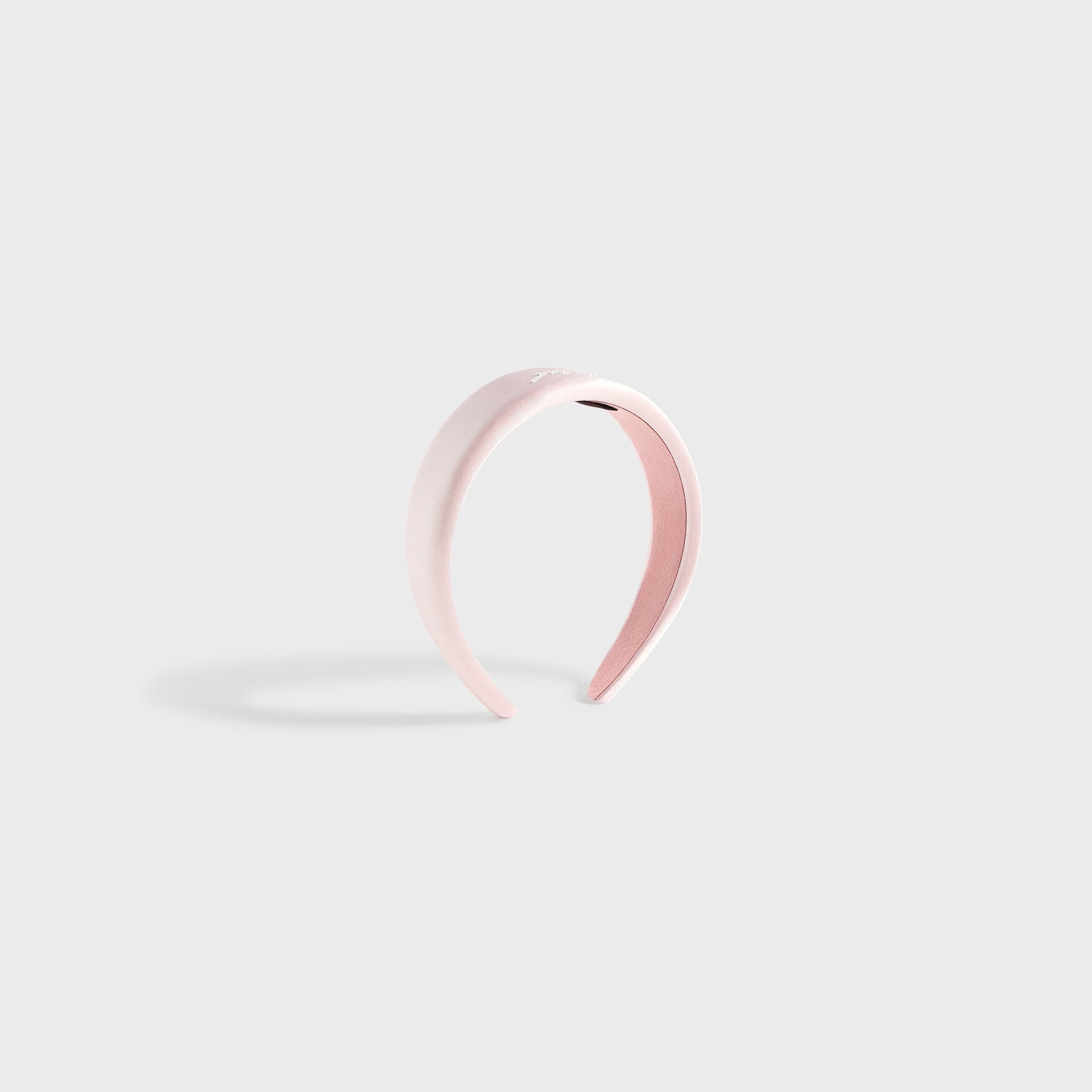 Kith Kids Satin Headband in Bloom pink, angled three-quarter view