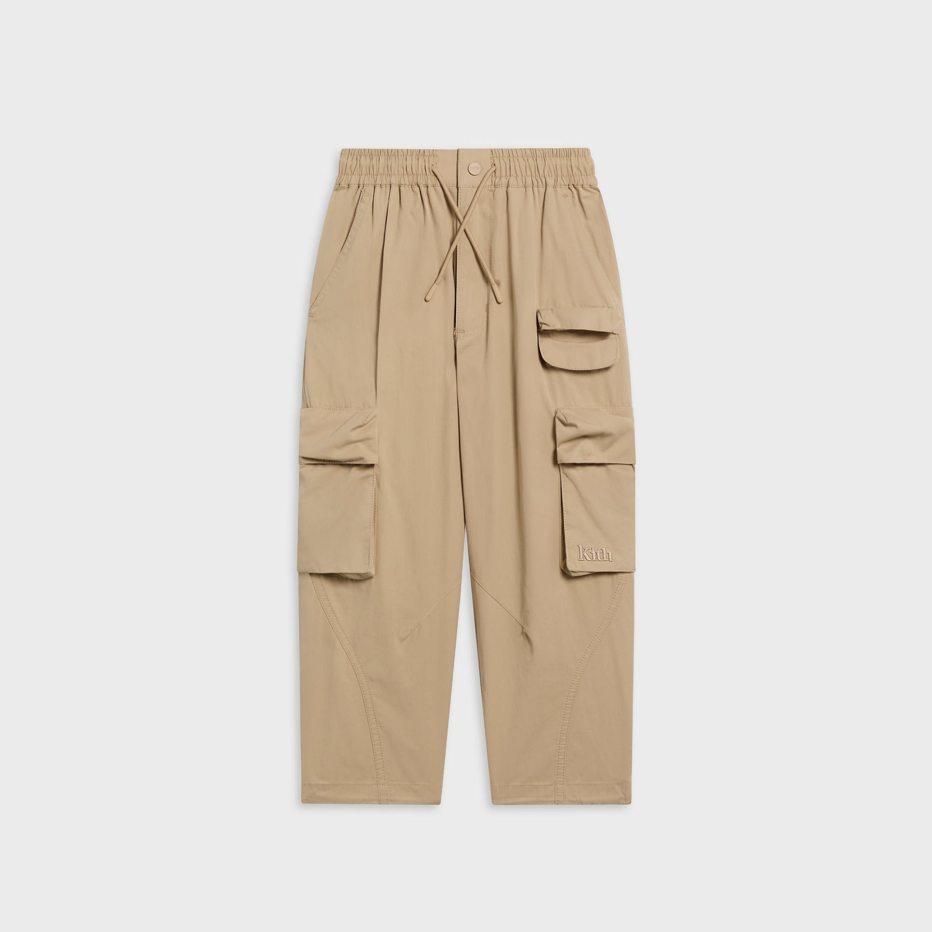 Kith Kids Chauncey Cargo Pant in tan canvas, front view with elastic drawstring waist and flap cargo pockets
