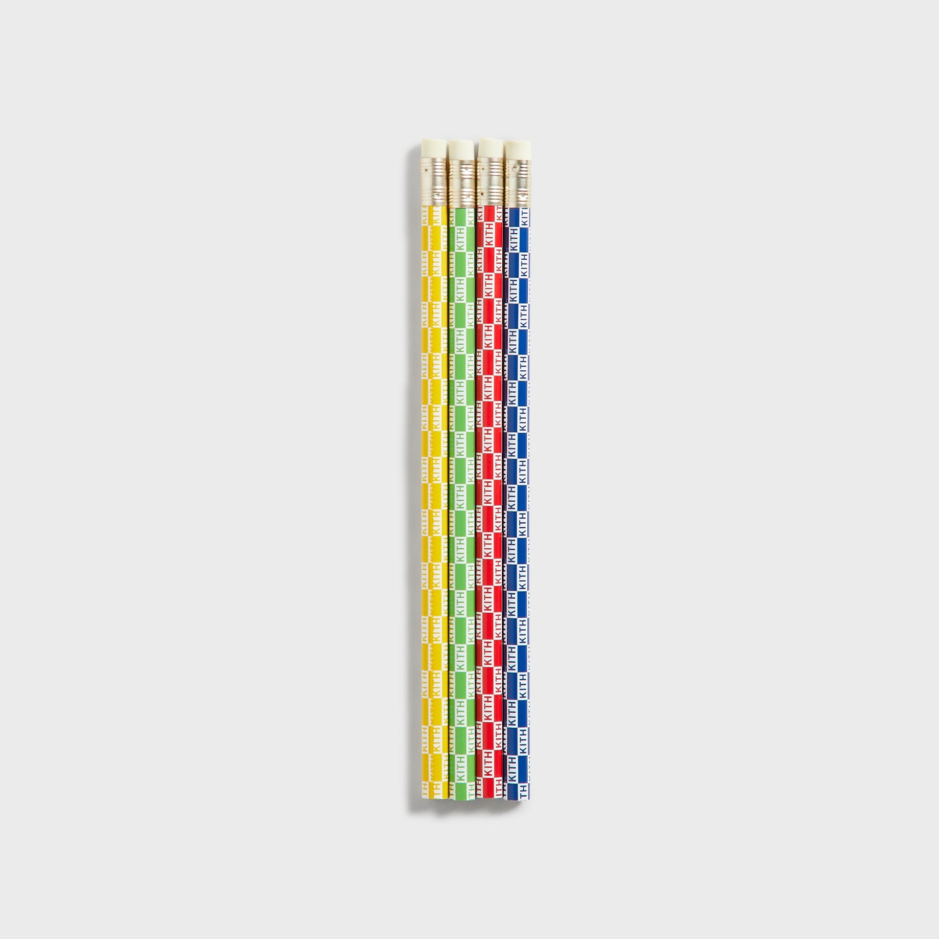 Kith Kids Back to School Set, four Kith checkerboard pencils in yellow, green, red and blue lined up