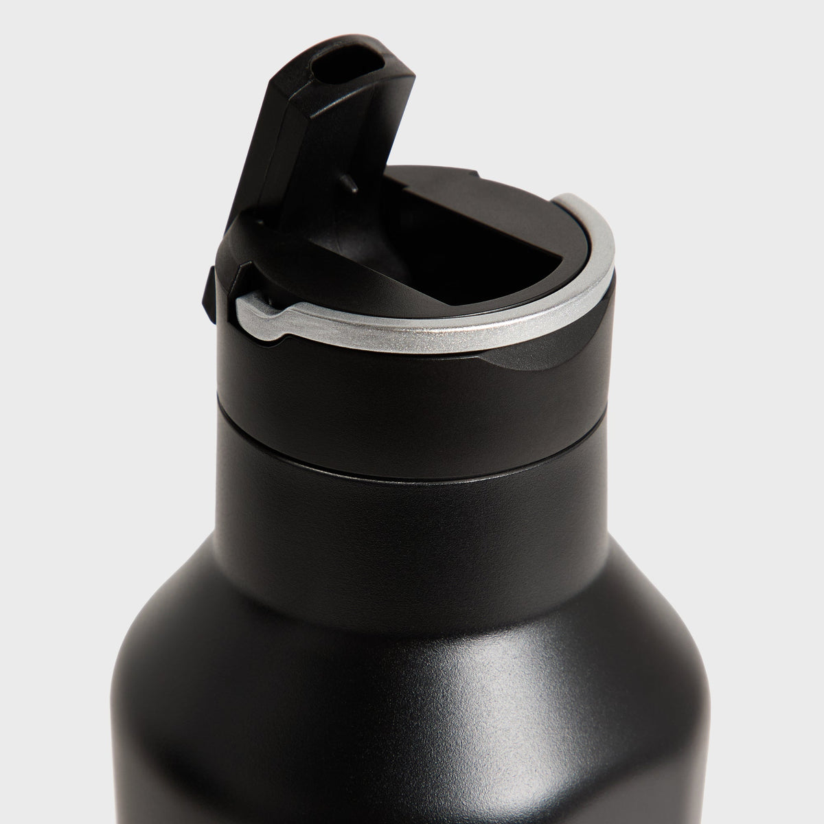 Close-up of the open flip-top spout lid on the Kith for Corkcicle Classic Sport Canteen