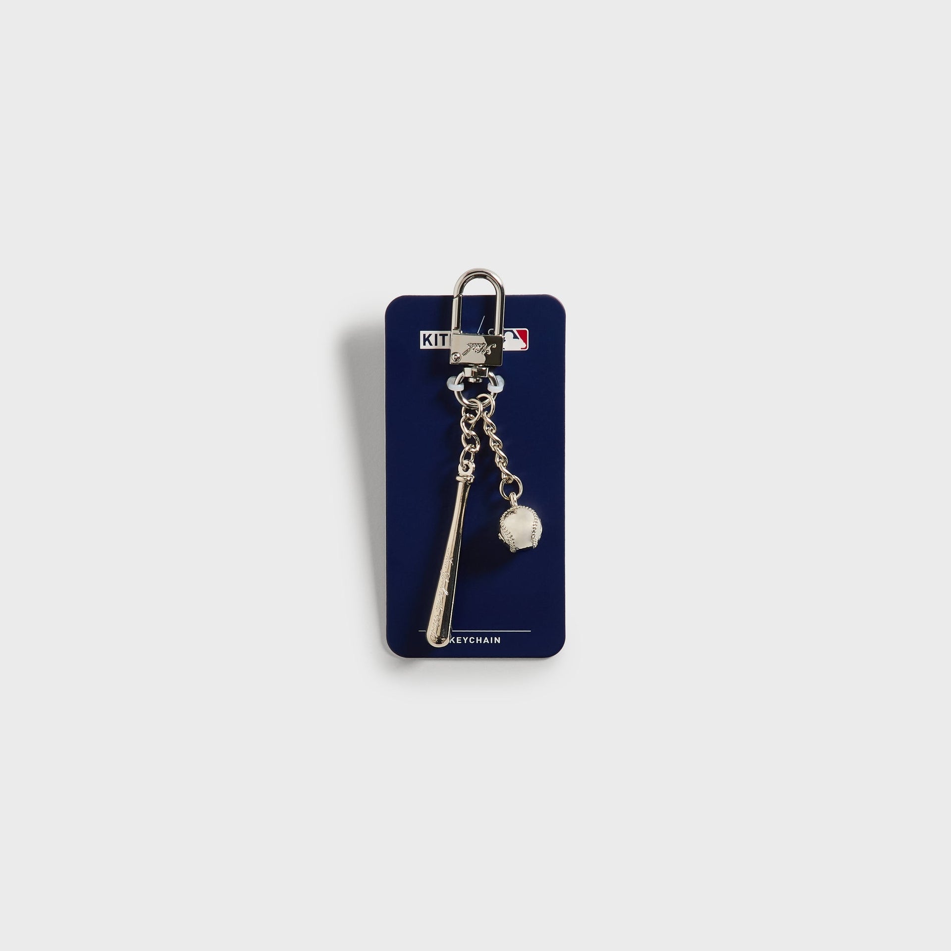 Kith x Yankees Baseball & Bat Keychain shown on branded Kith MLB packaging card