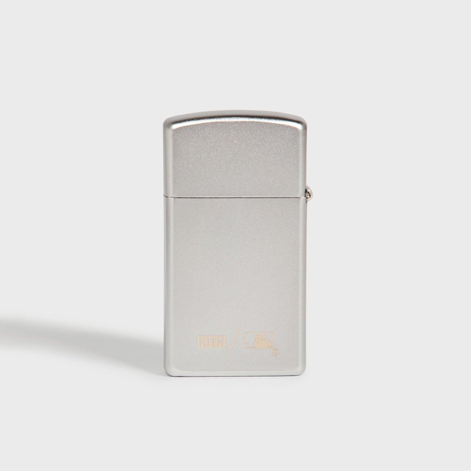 Kith x New York Yankees silver Zippo lighter, back panel with Kith and MLB logo engraved