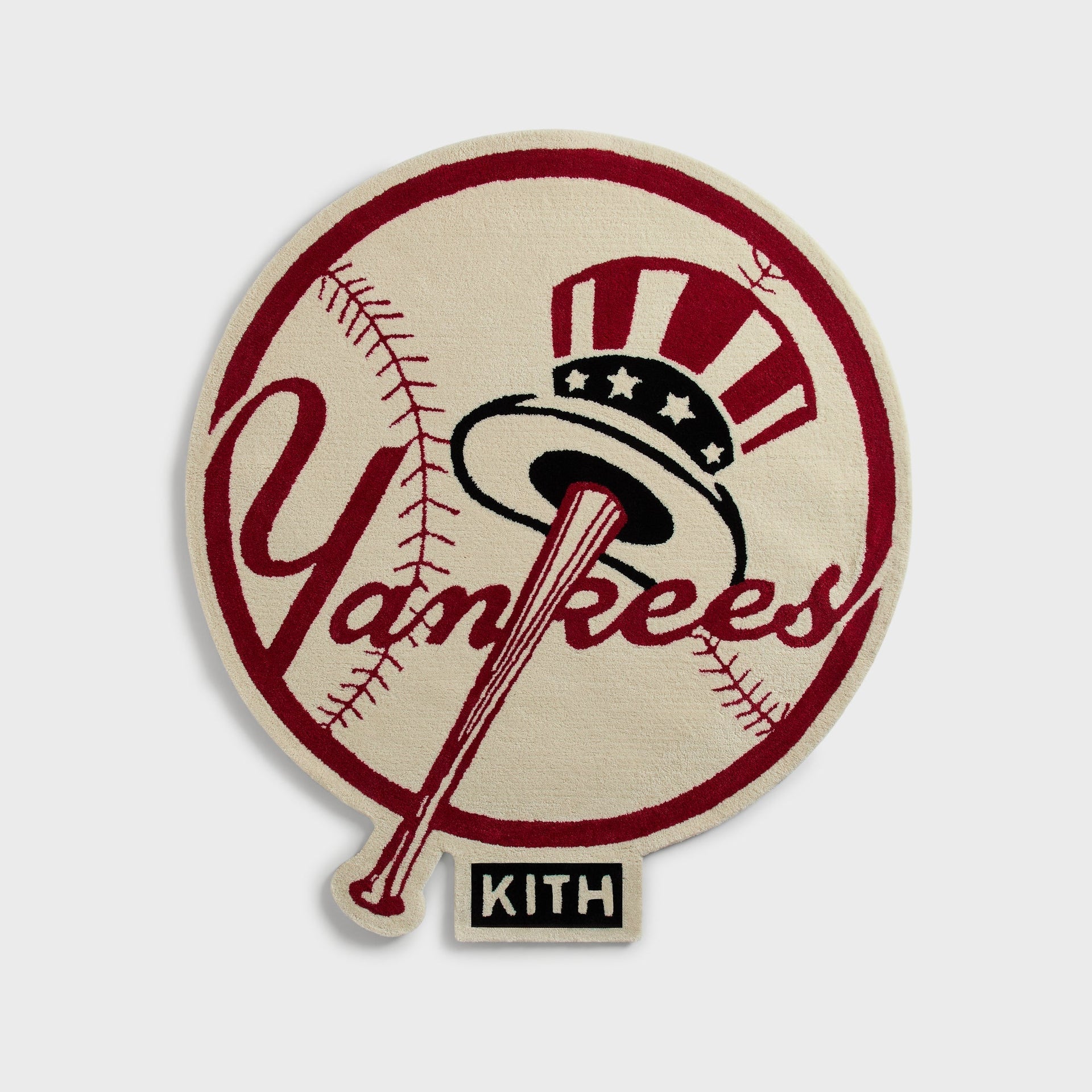 Kith for the New York Yankees tufted rug shaped like the Yankees baseball logo with bat and top hat