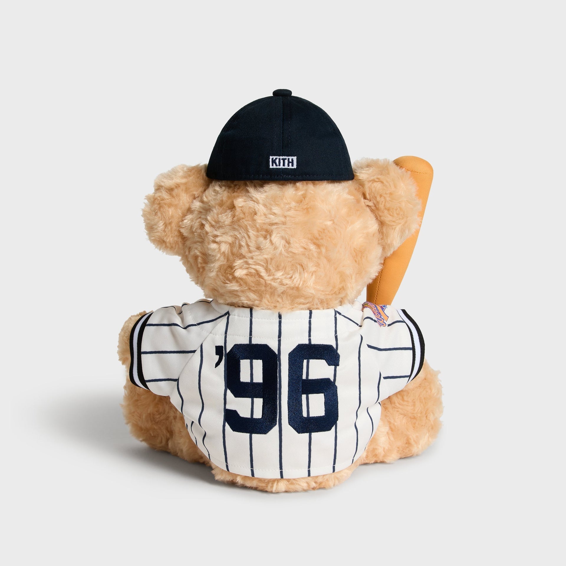 Kith x New York Yankees Teddy Bear in Sandrift, back view showing '96 jersey embroidery