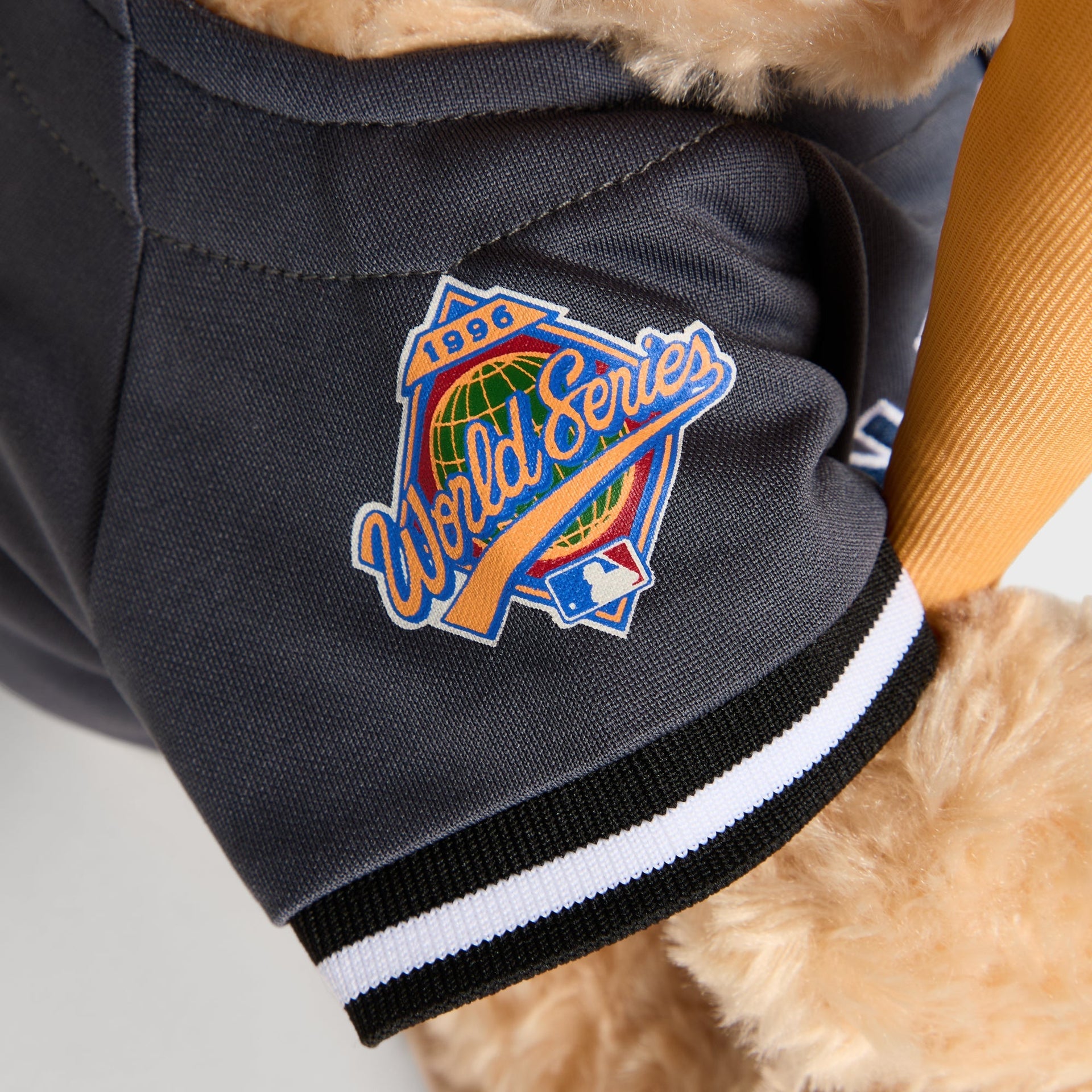 Close-up of 1996 World Series patch on the jersey sleeve of the Skyscraper Teddy Bear