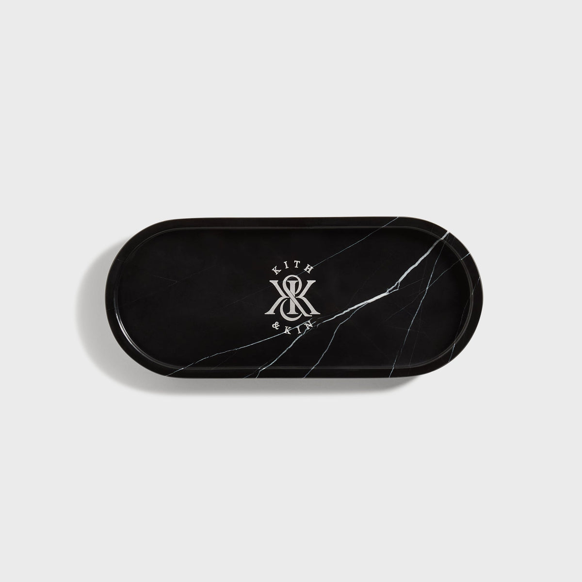 Kith Marble Tray in black marble with white veining and Kith & Kin logo, top view