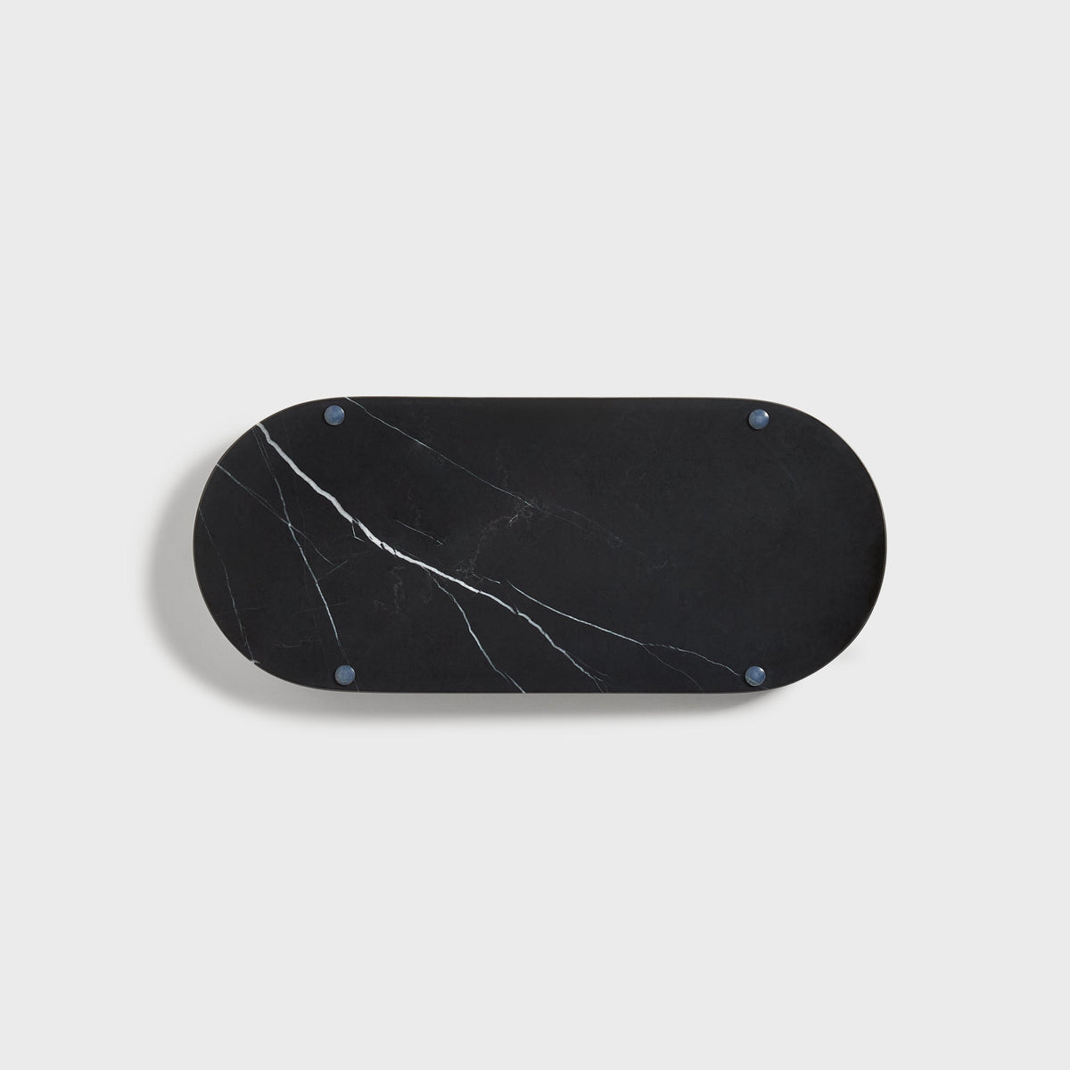 Kith Marble Tray in black marble, underside view with blue-grey feet