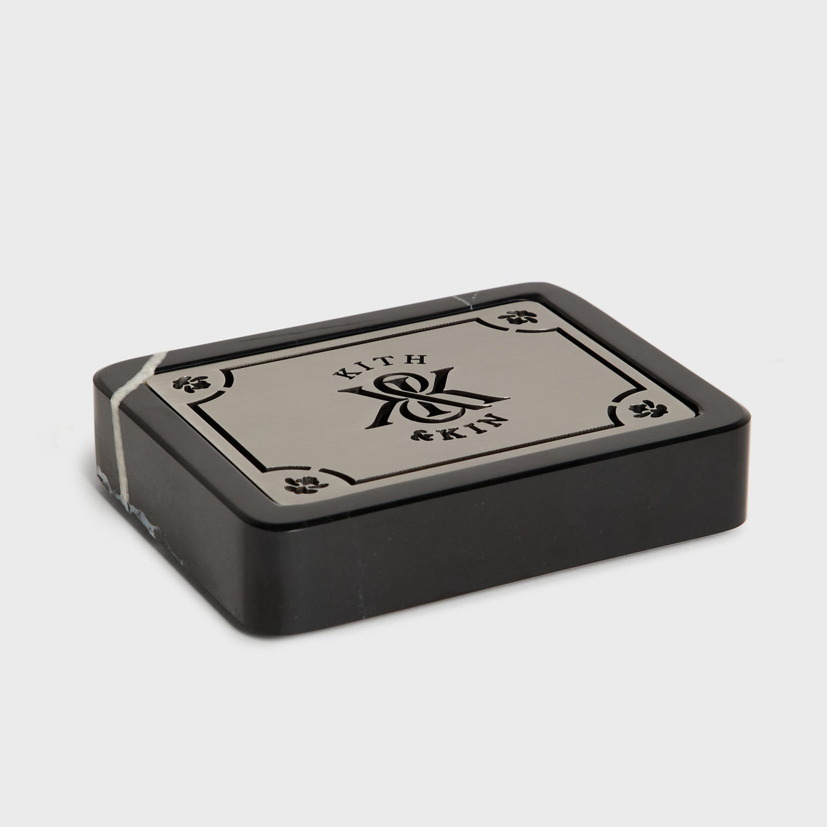Kith Marble Soap Dish black with metal lid on, angled view