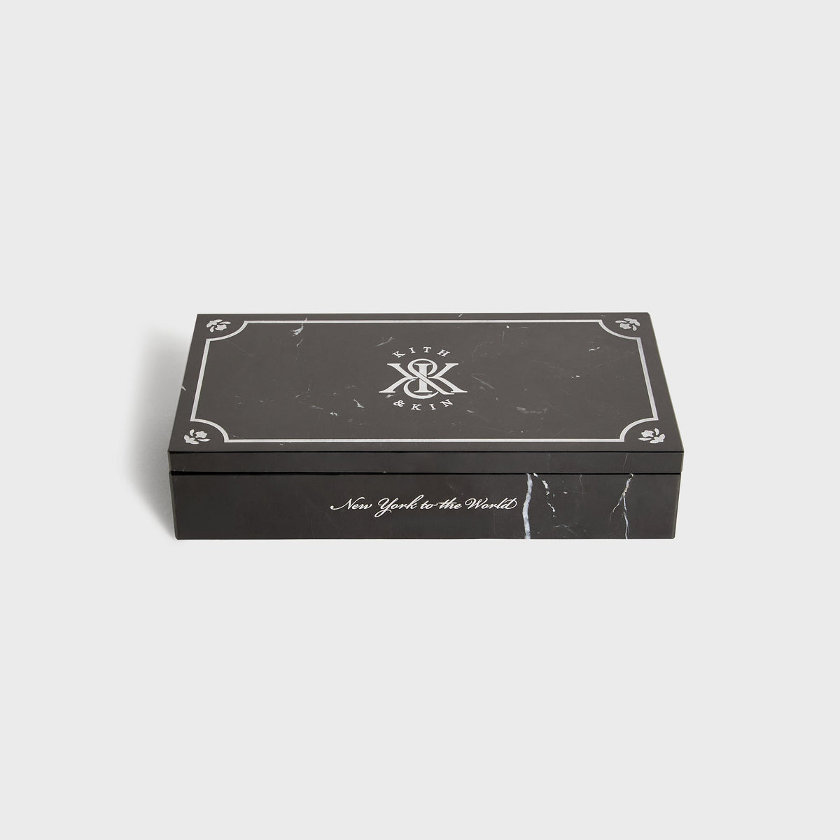 Kith Marble Box black with lid on, side view showing New York to the World script