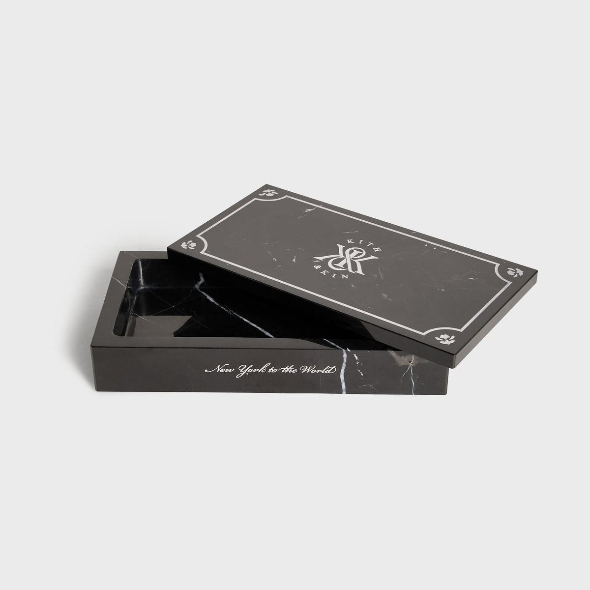 Kith Marble Box black with lid slightly open, side view