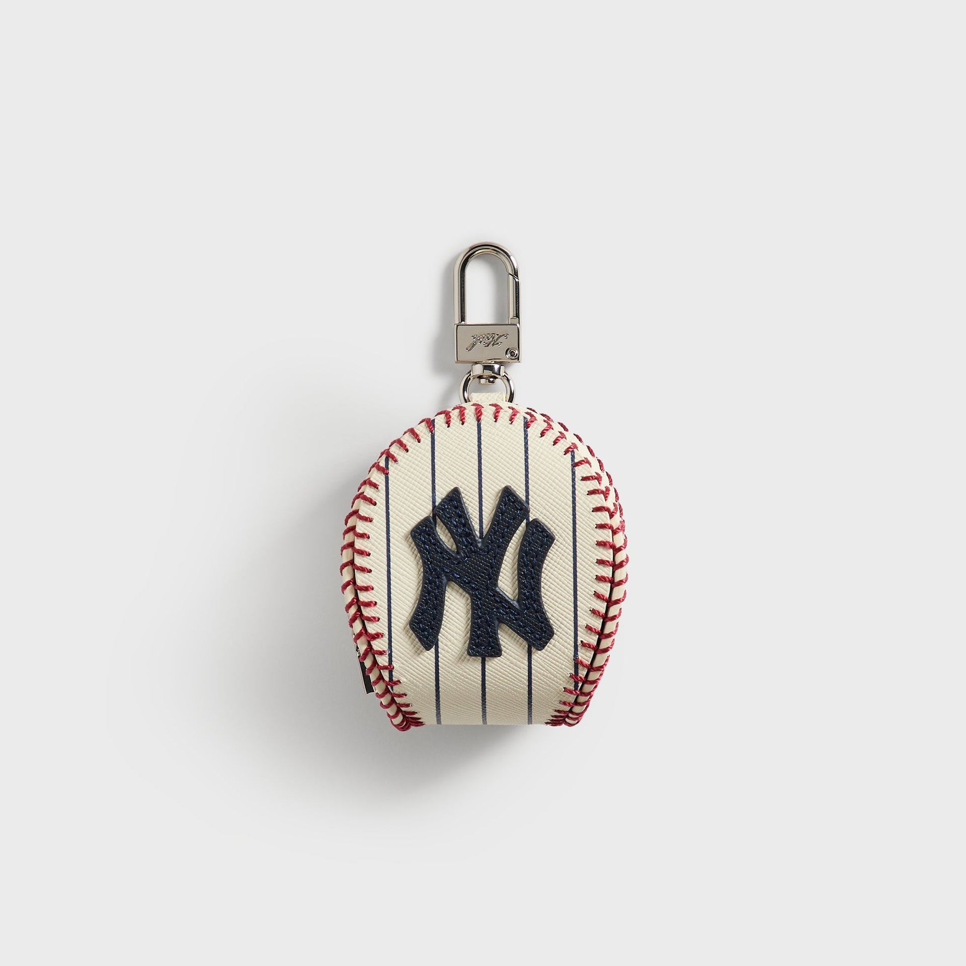 Kith for the New York Yankees leather baseball pouch in cream Sandrift with pinstripes, front view