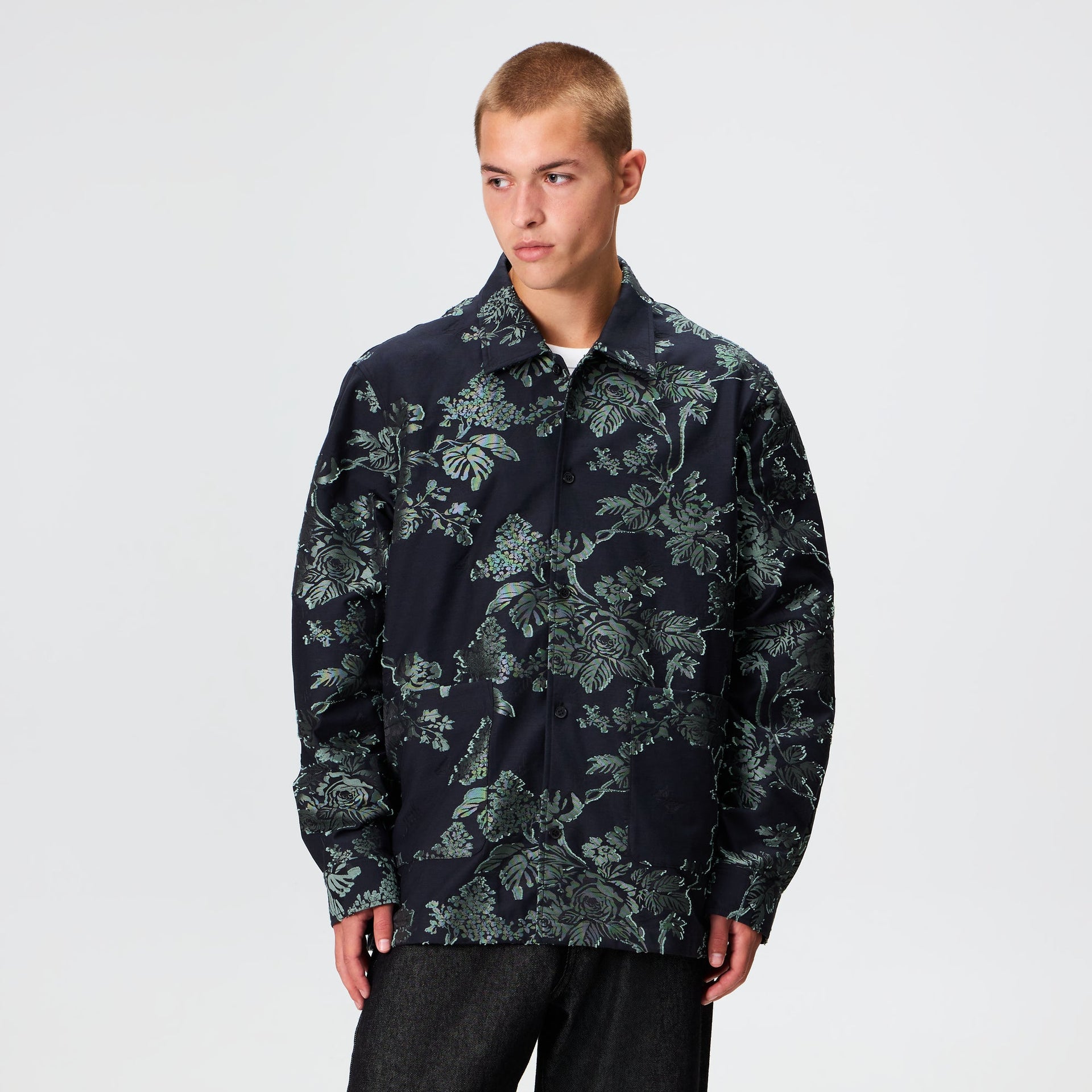 Man wearing the Kith for Needles BCO shirt in black floral jacquard, front view