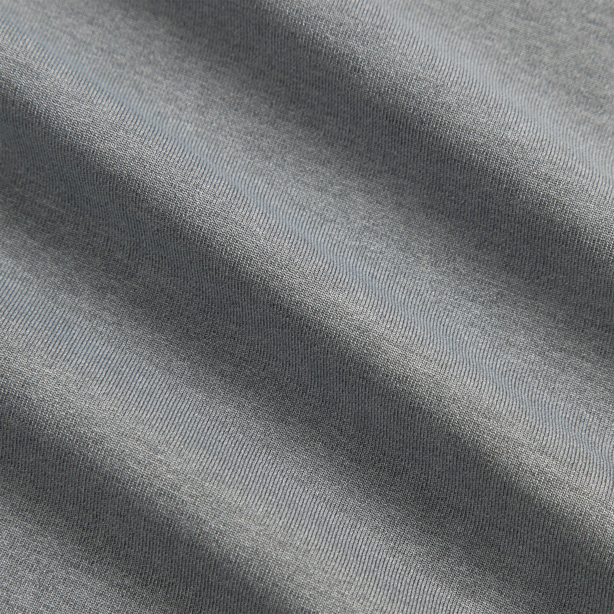 Close-up of Kith Garment-Dyed Paneled Donovan Tee heathered grey fabric texture