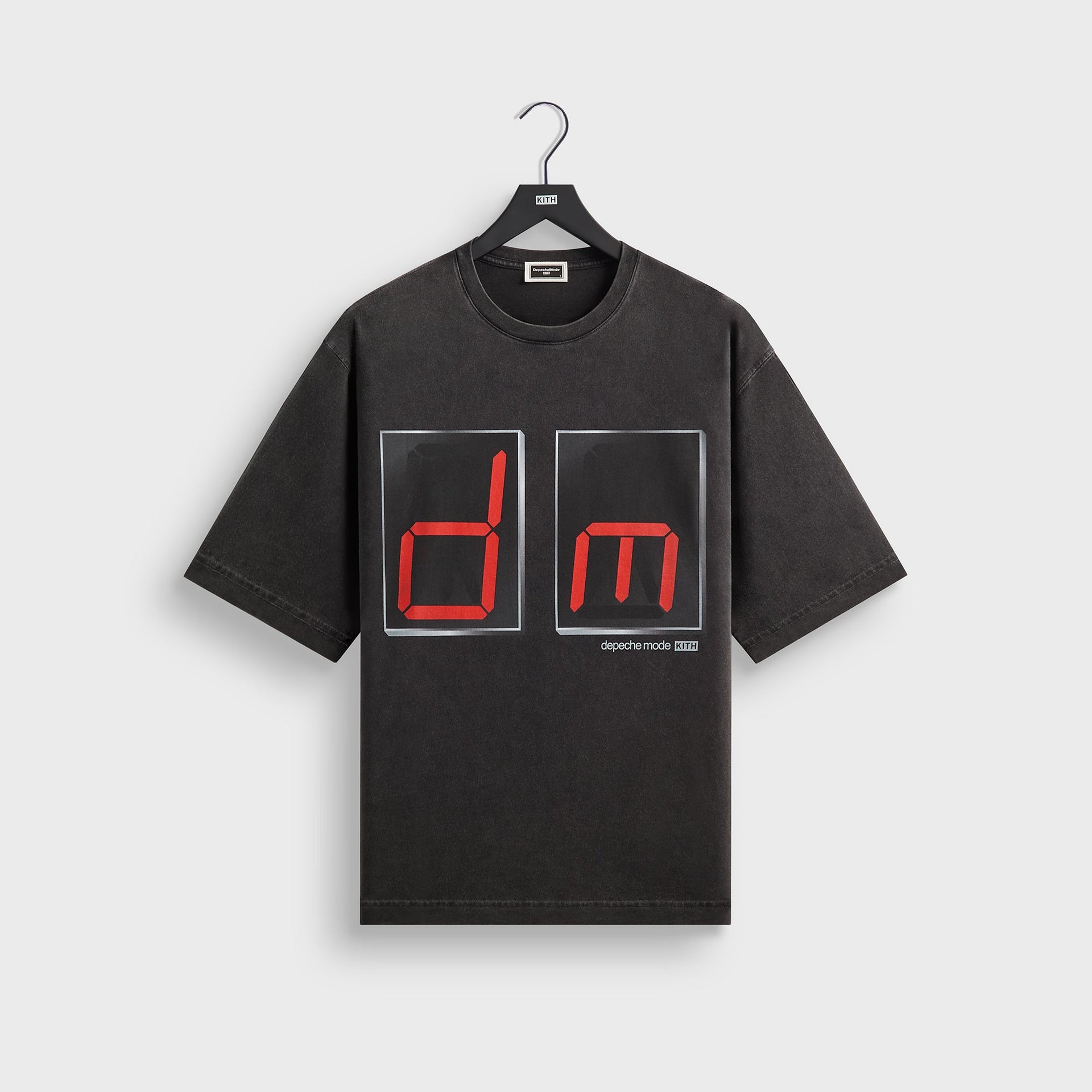 Kith Records Depeche Mode Vintage Alex Tee in washed black, front view with red LED-style dm logo graphic