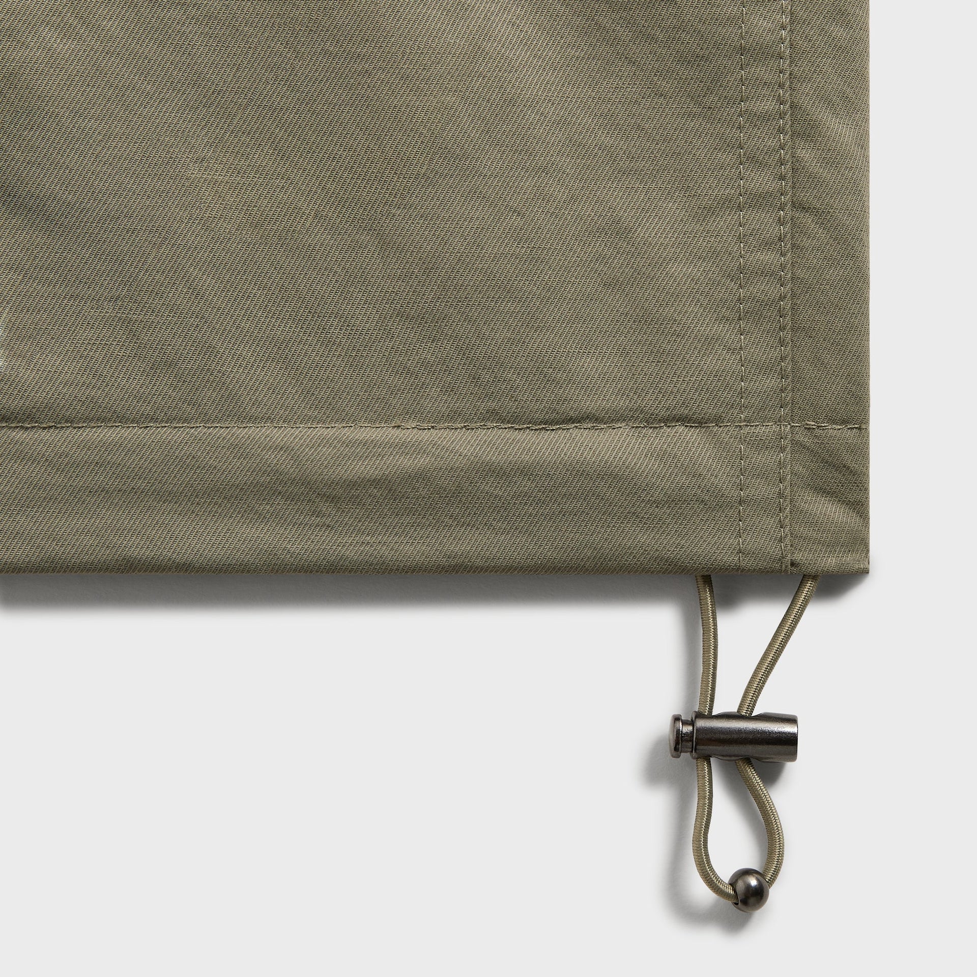 &Kin Nikolai Cropped Trench detail, hem with elastic drawcord and metal toggle, Scene sage