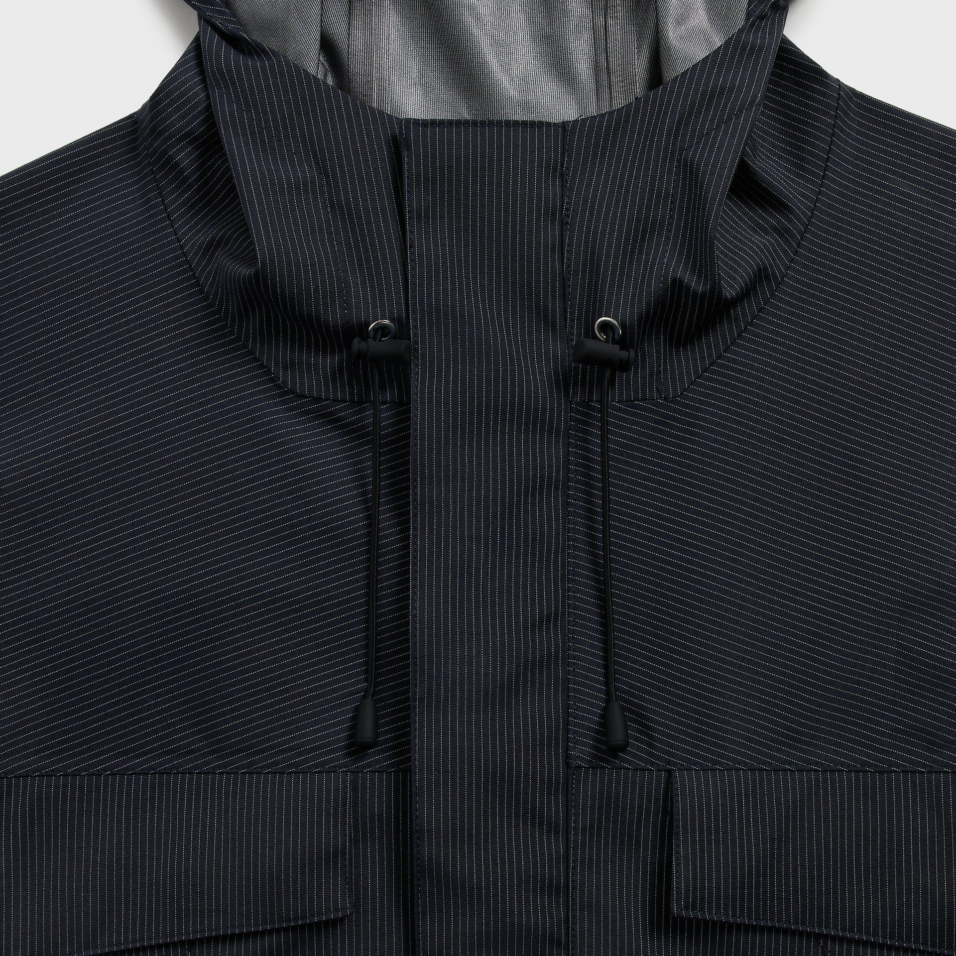 &Kin Gael Parka detail: stand collar and hood with black drawcord toggles, navy pinstripe