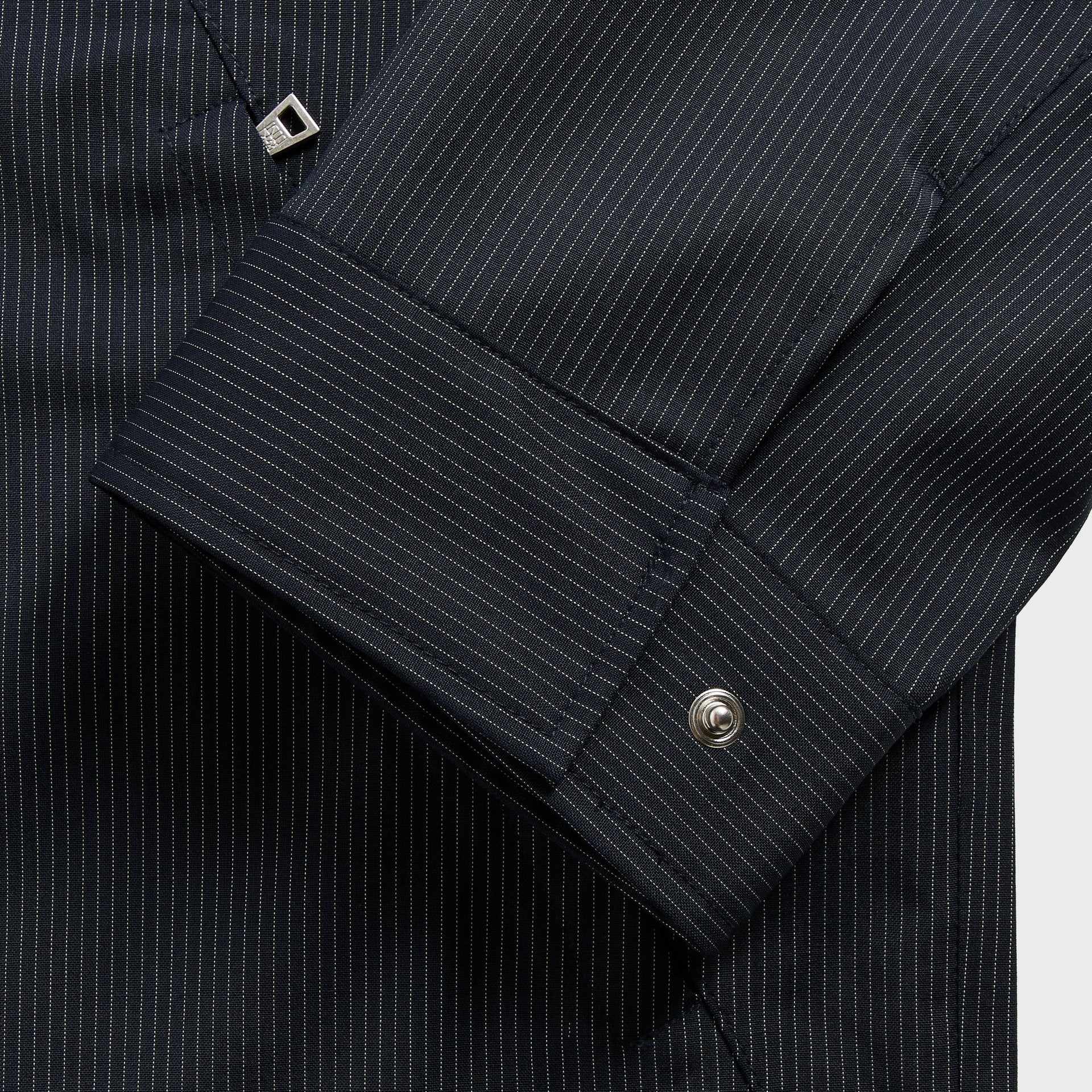 &Kin Gael Parka detail: snap-button cuff with silver &Kin metal tab, navy pinstripe