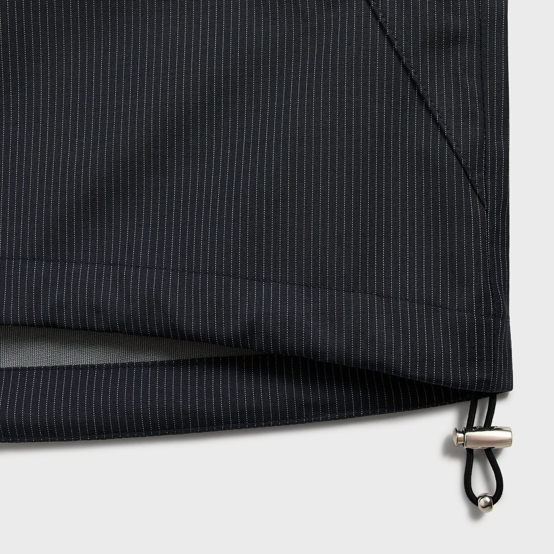 &Kin Gael Parka detail: hem with silver drawcord toggle and side vent, navy pinstripe