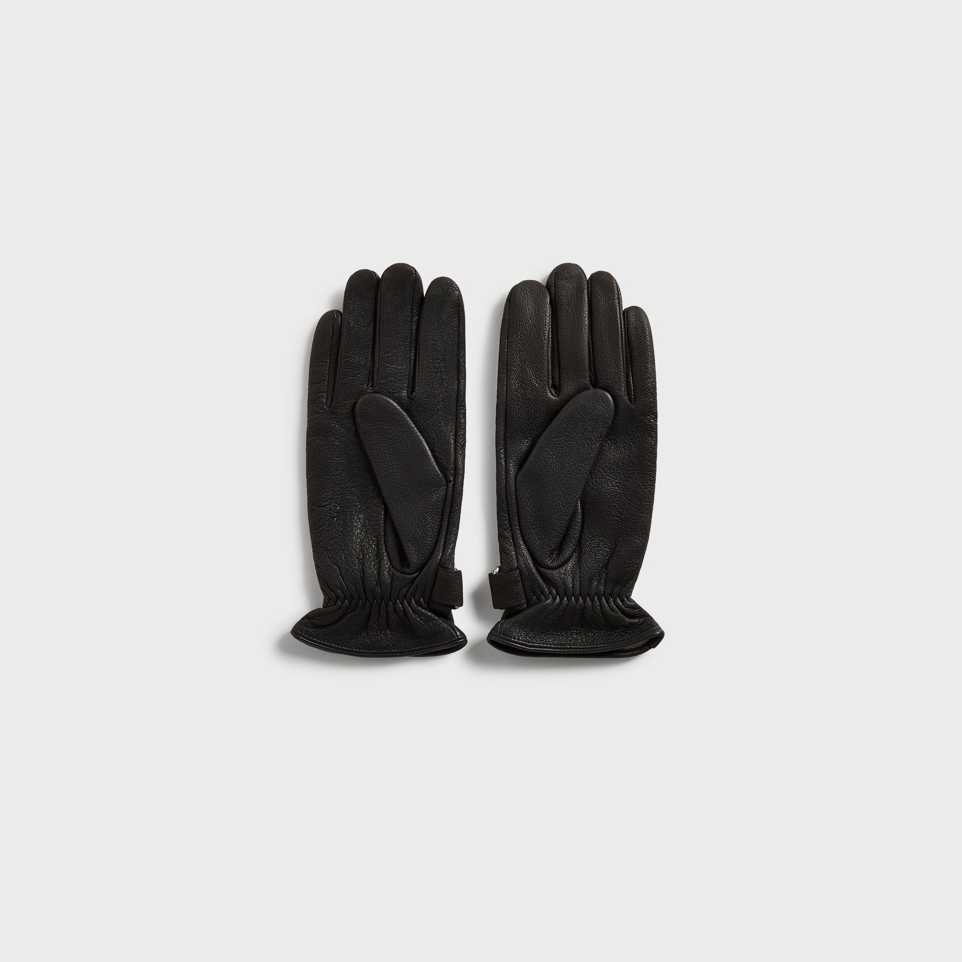 Kith Tumbled Leather Manhattan Gloves in Black, flat lay palm-side view showing finger seams