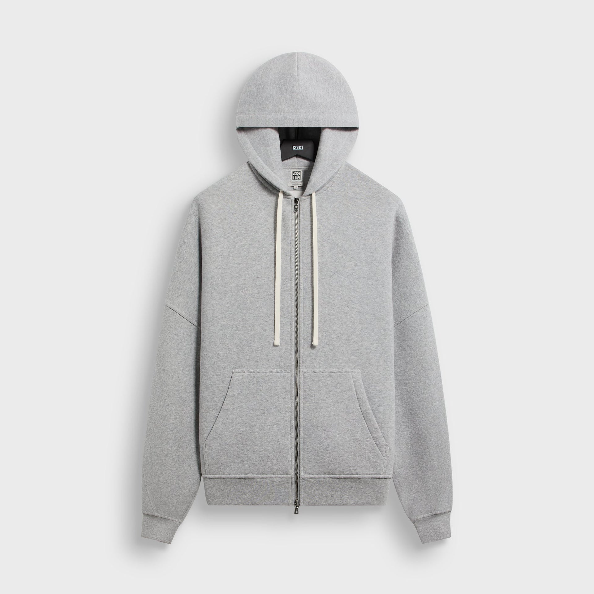 &Kin Plush Fleece Hiroshi Zip Front Hoodie in Heather Grey, front view on hanger with cream drawcords and pockets