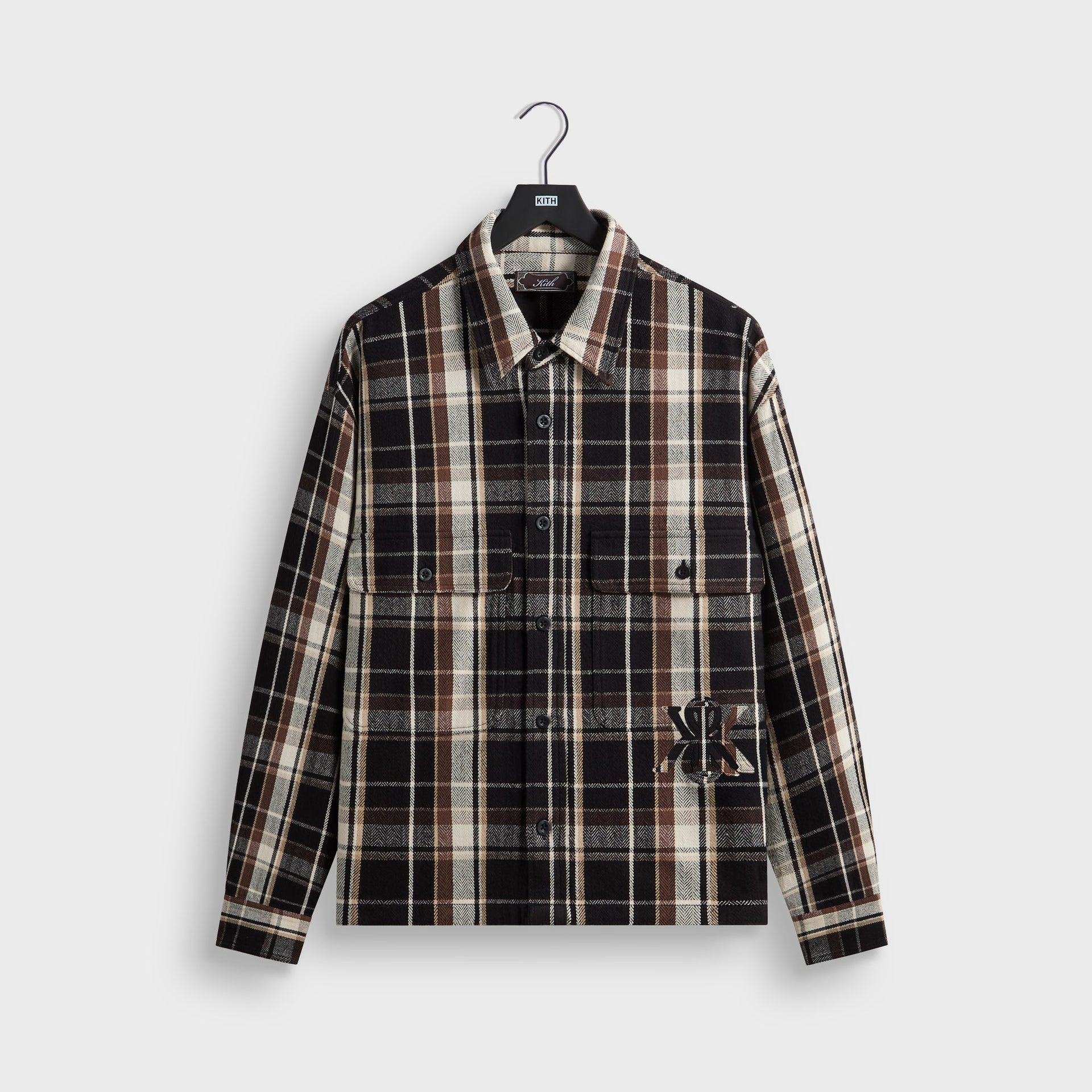 Kith Plaid Henson buttondown shirt in black, brown and cream plaid flannel, front flat lay