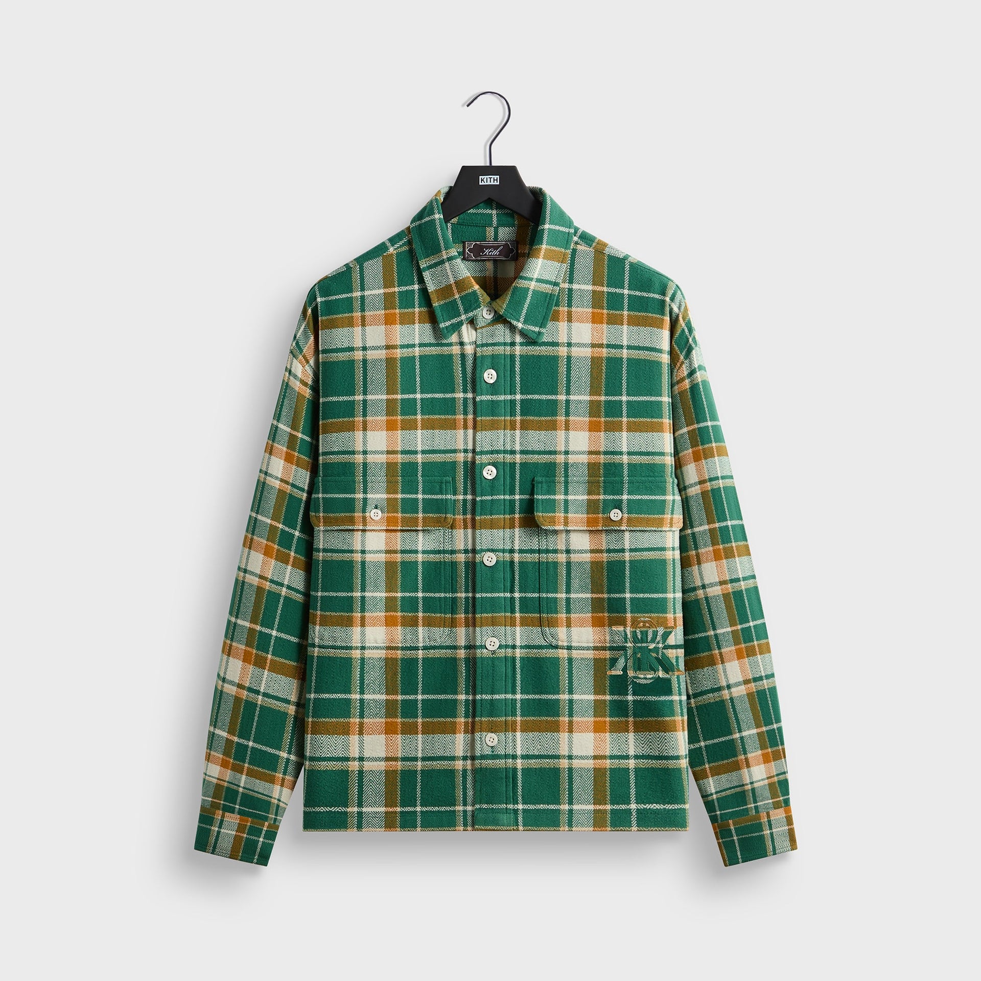 Kith Plaid Henson buttondown shirt in green, orange and cream alpine plaid flannel, front flat lay