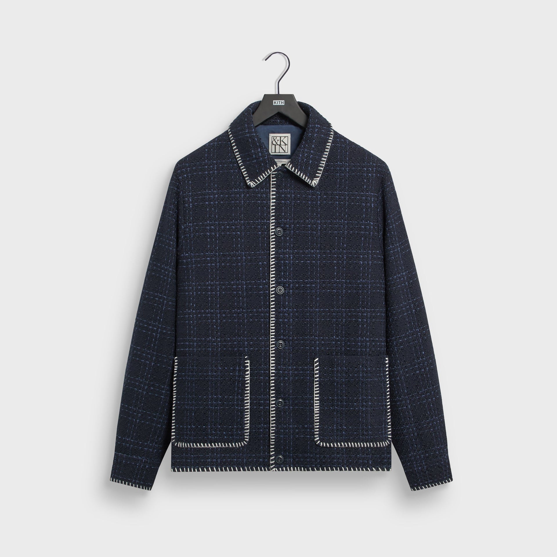 &Kin Tweed Boxy Collared Overshirt in Nocturnal navy, front view on hanger with white blanket-stitch trim and patch pockets