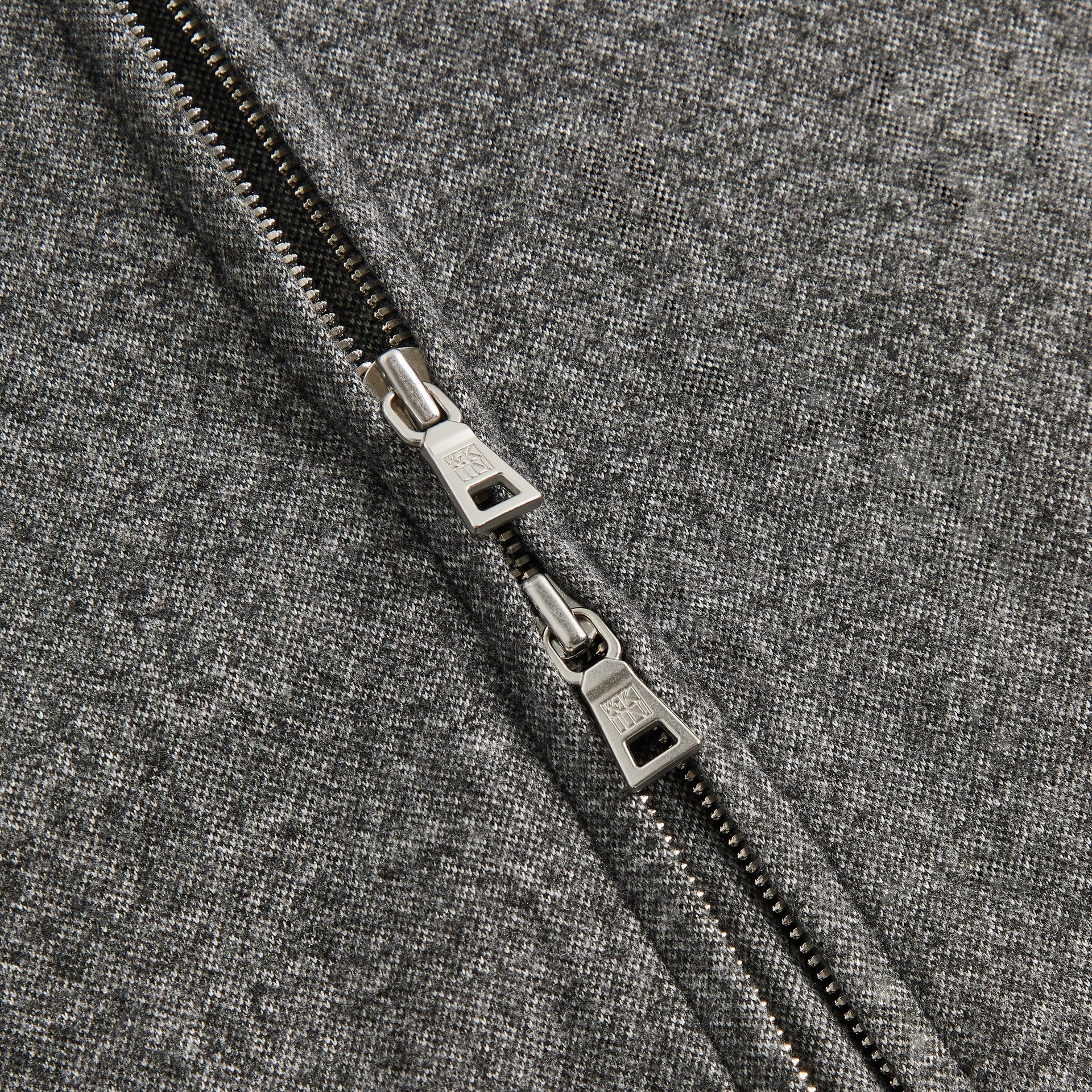 &Kin Flannel Jersey Stephen Track Jacket detail, two-way &Kin engraved zipper pulls on charcoal flannel