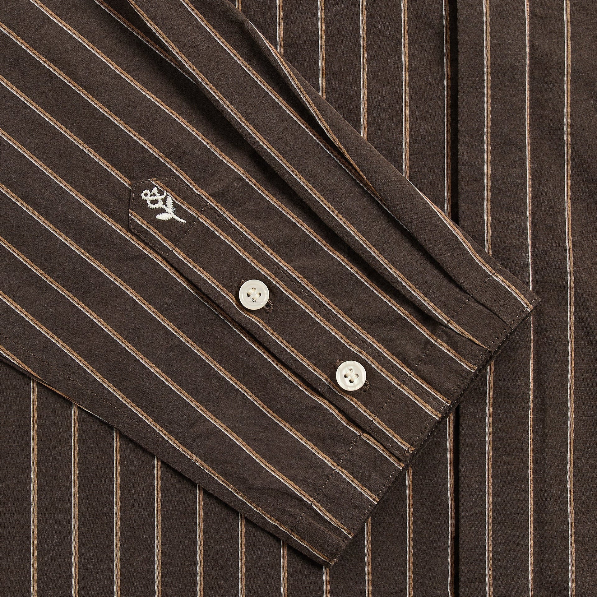 &Kin Nico shirt cuff detail with buttons and embroidered &Kin rose logo on placket