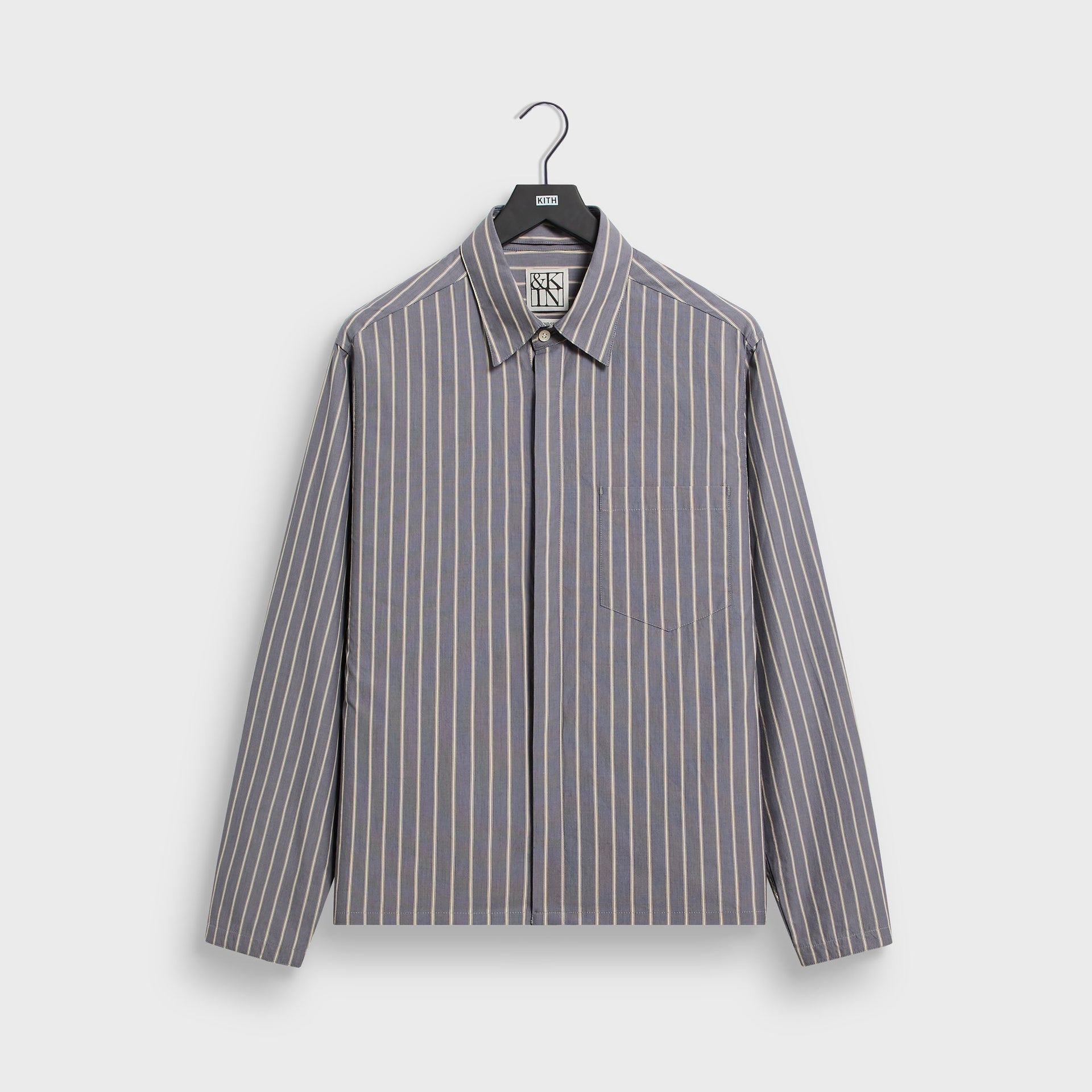 &Kin Striped Poplin Nico Shirt in Chasm grey, front on KITH hanger with spread collar, chest pocket, hidden placket