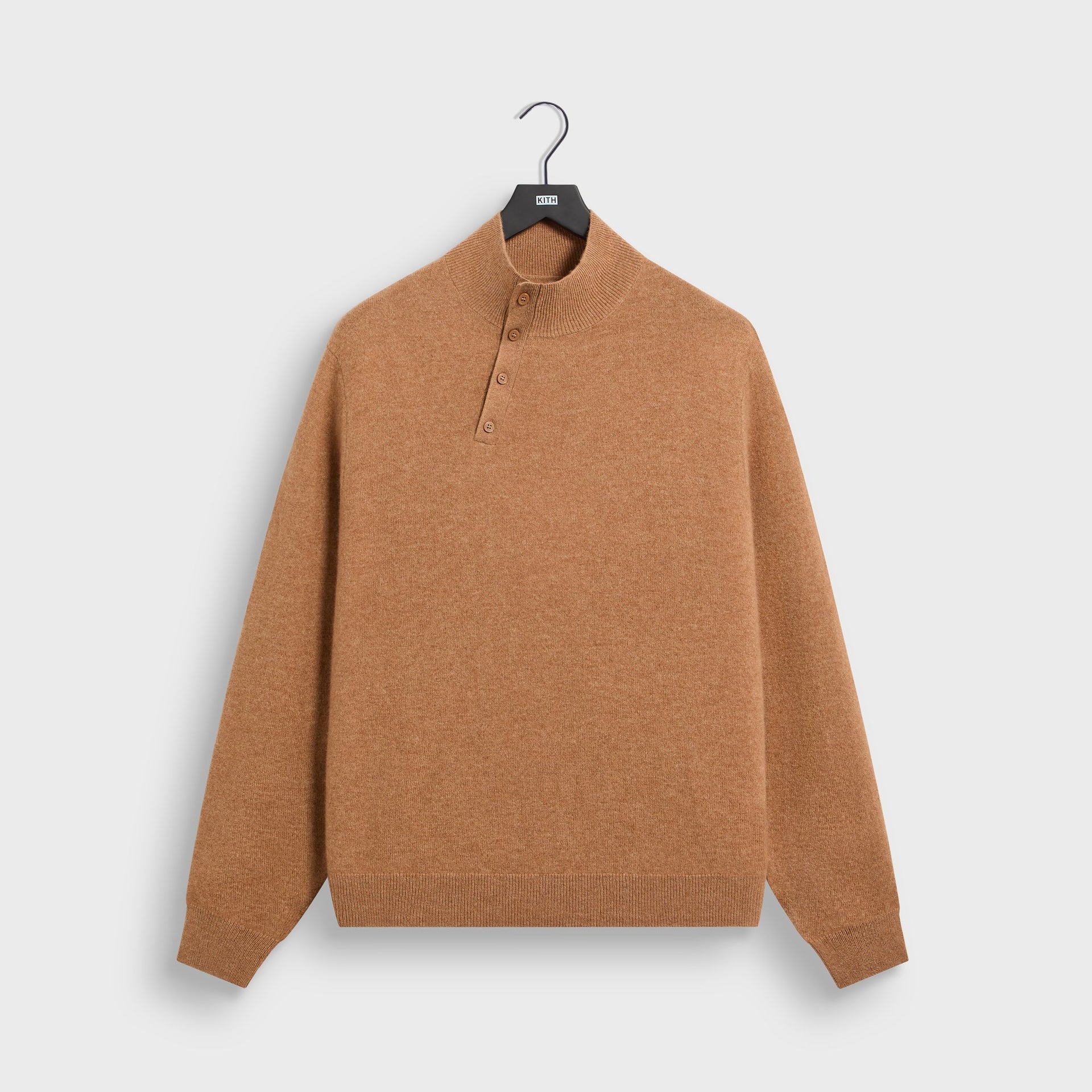 &Kin Cashmere Cyrus Turtleneck in Sand Dune tan, front on KITH hanger with mock neck and button placket