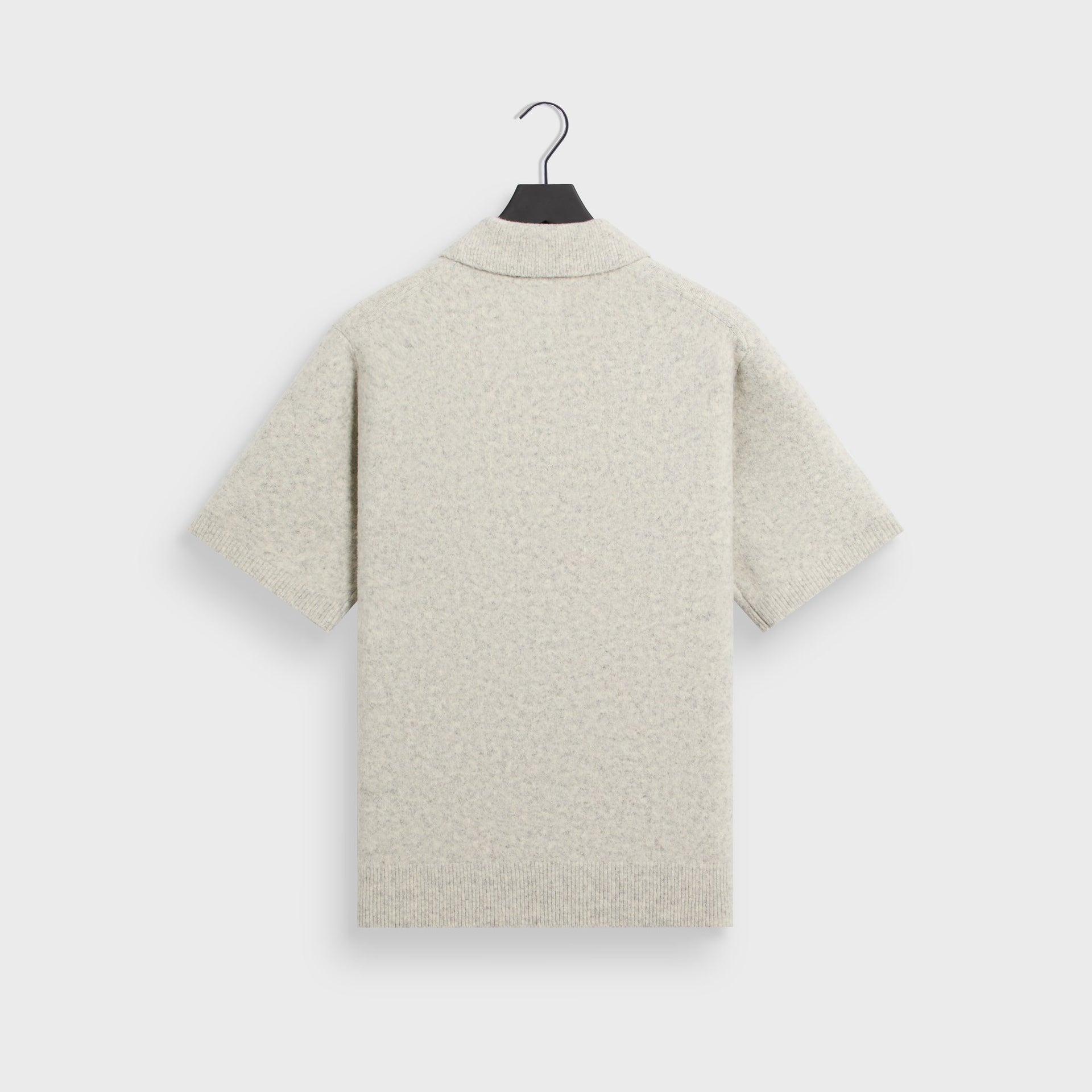 Kith Boucle Tobey polo in light heather grey, back flat lay