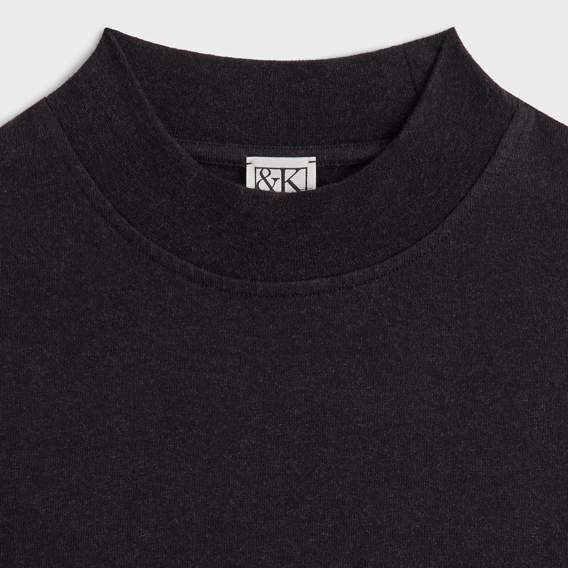 &Kin Mock Neck James Tee mock-neck close-up with the woven &Kin box label