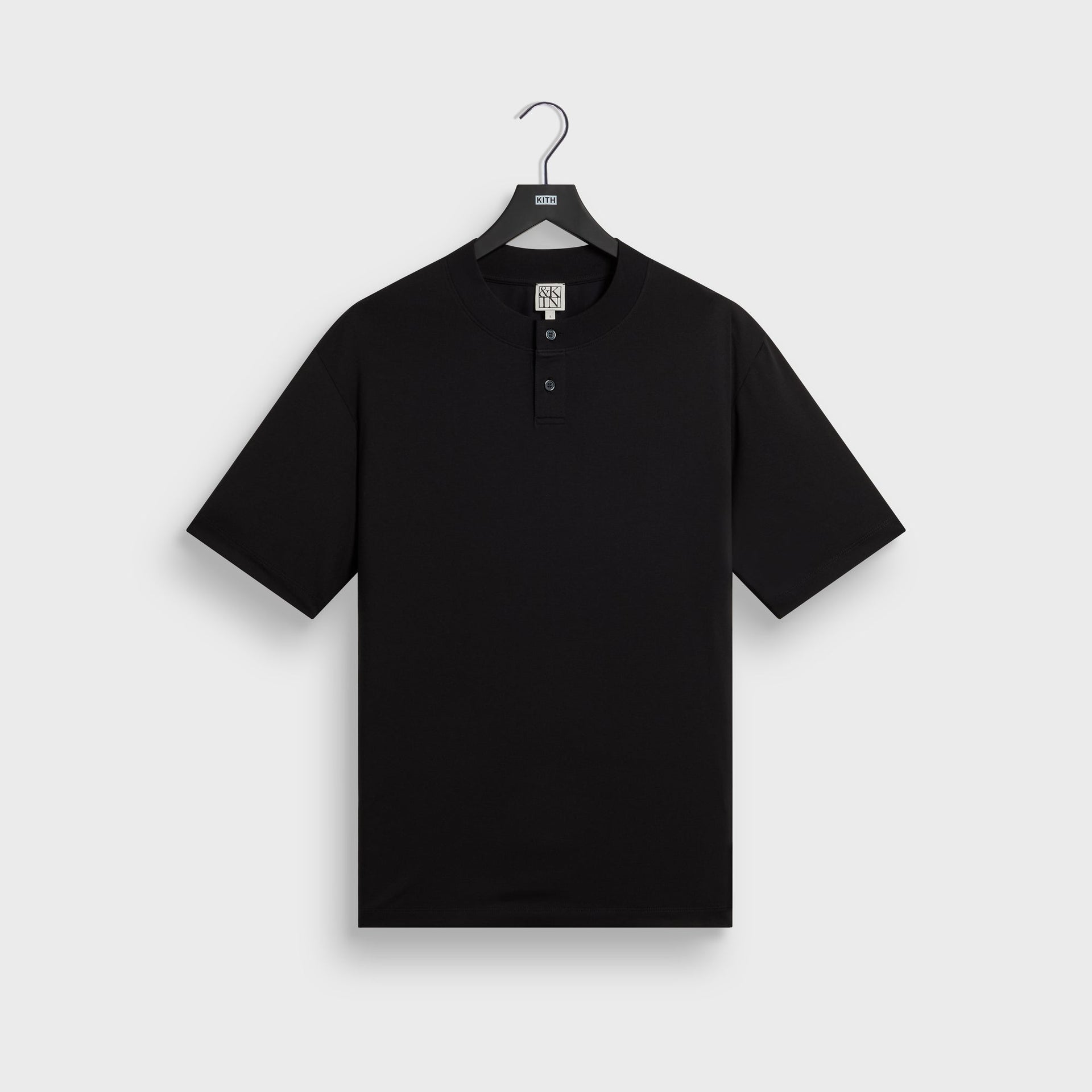 &Kin Albie Henley Tee in black, front on KITH hanger with two-button placket and short sleeves