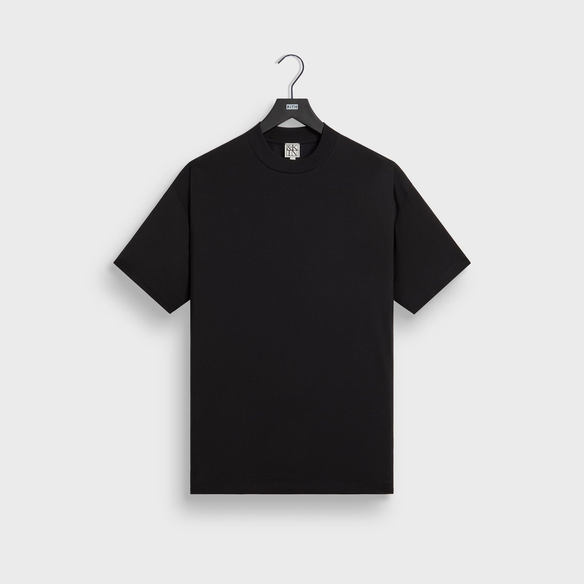 &Kin Mock Neck Albie Tee in black, front view on KITH hanger, short sleeves