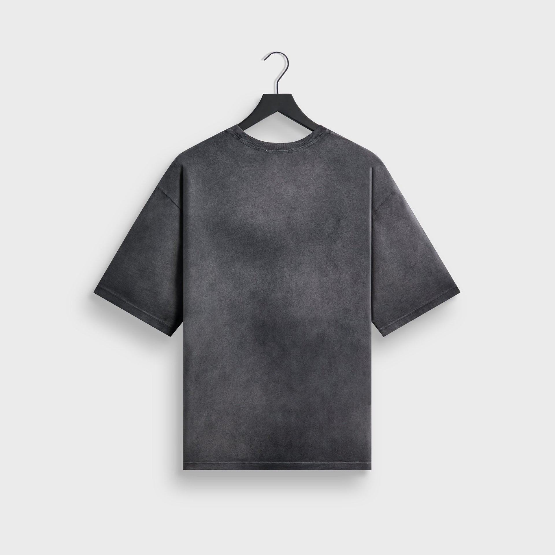 Kith Jones tee in faded black cotton, back flat lay on hanger