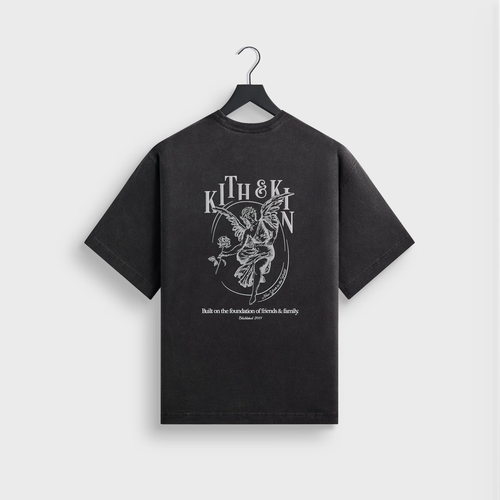 Kith Guardian Alex boxy vintage tee in faded black, back flat lay with Kith & Kin angel graphic
