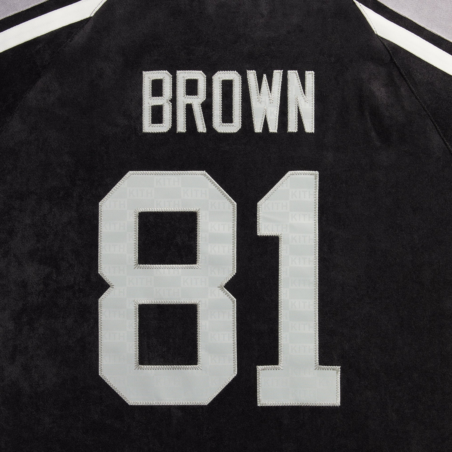 Close-up of the Brown 81 name and number on the back of the Kith NFL Raiders Leon shirt