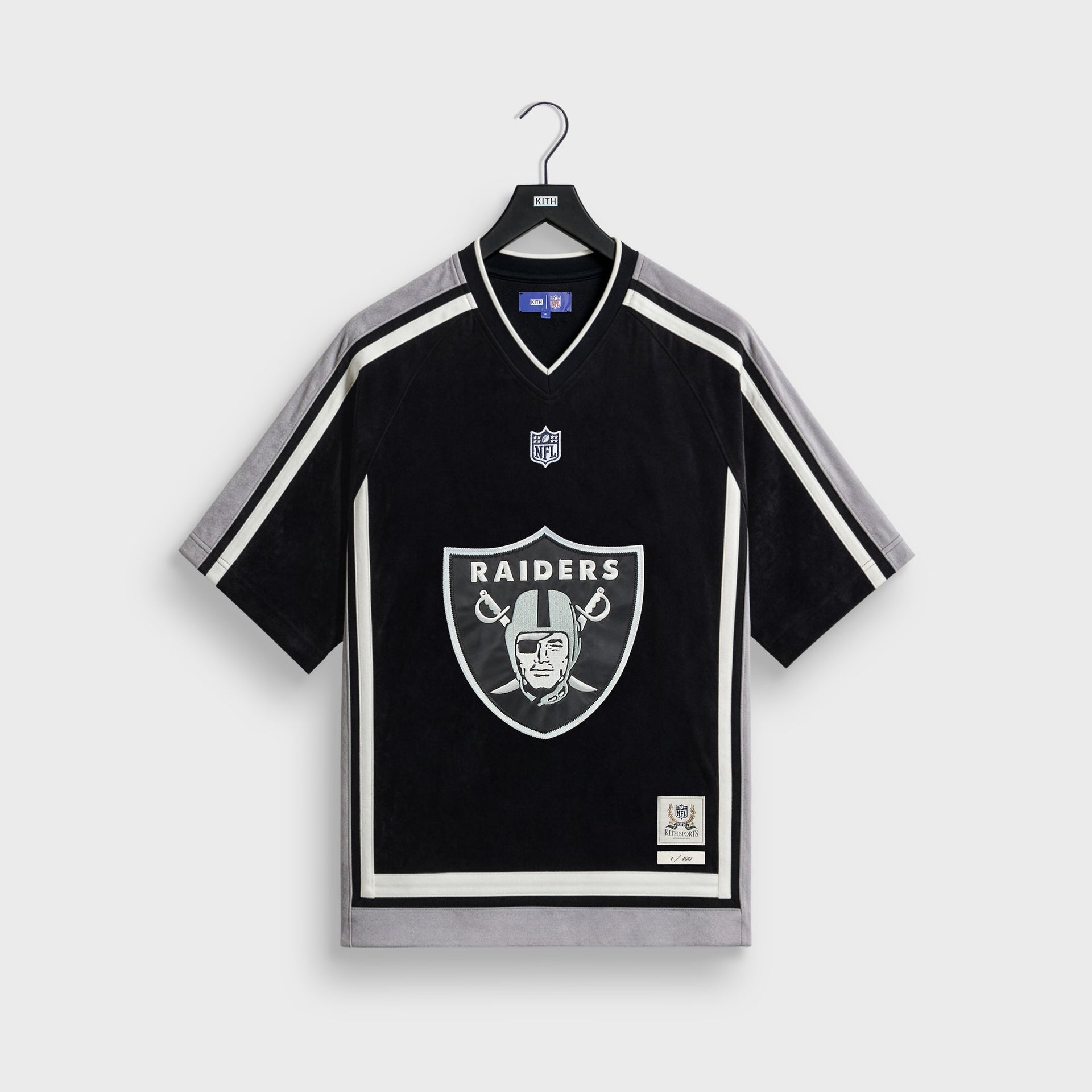 Kith and the NFL for the Oakland Raiders Leon shirt in black with silver trim, front flat lay