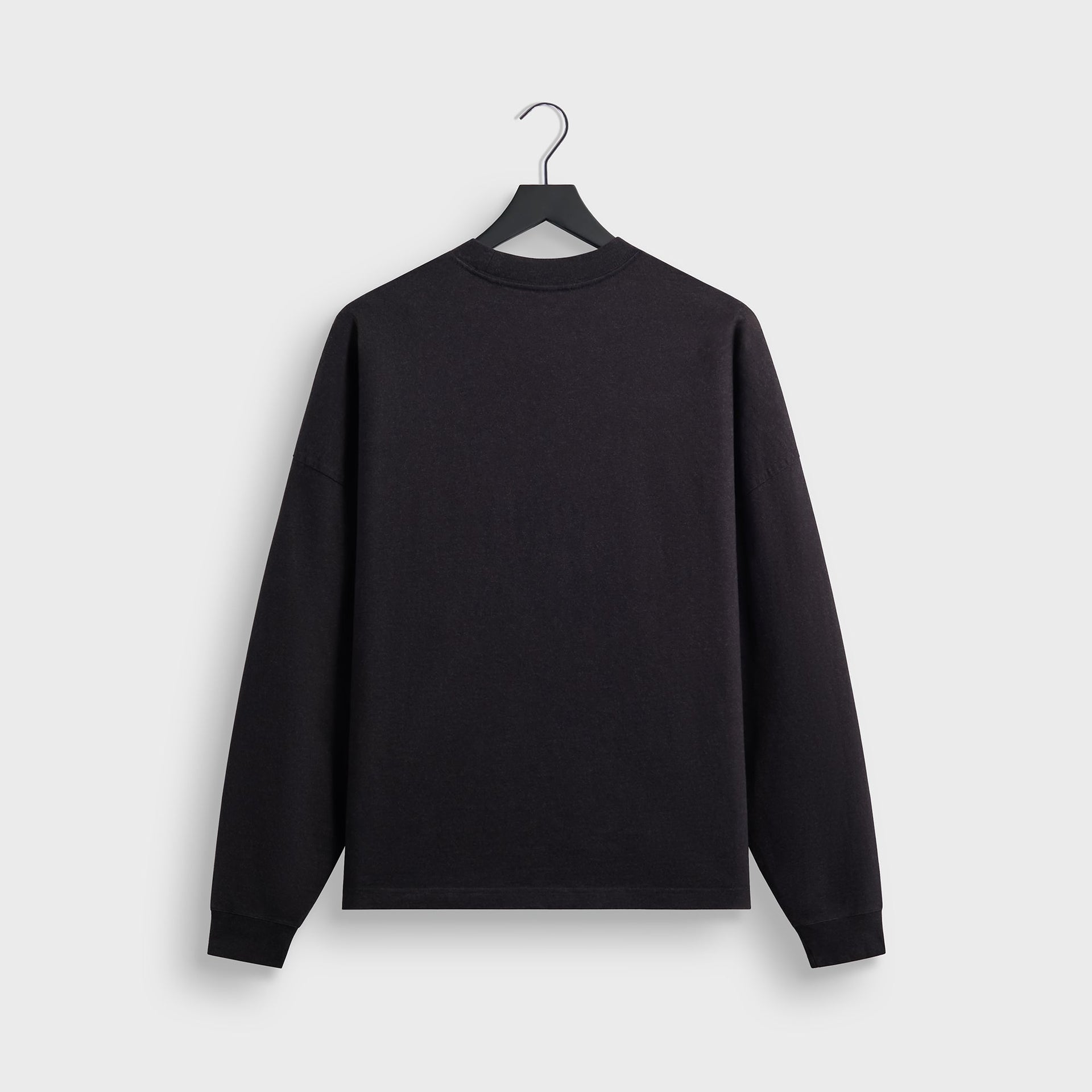 &Kin Long Sleeve Lawson Tee in black, back view on hanger with drop shoulders