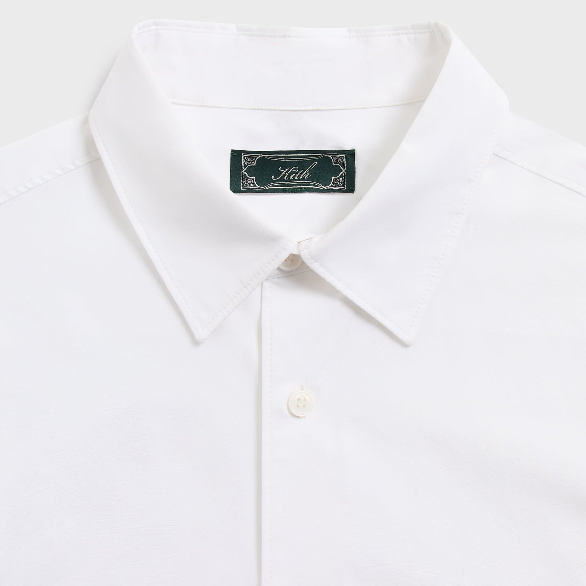 &Kin Georgie Shirt detail, white point collar with green Kith woven label