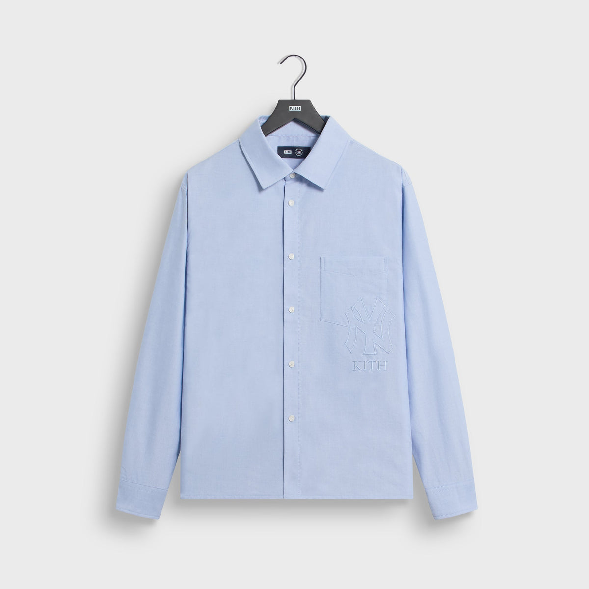 Kith for New York Yankees Oxford Deon overshirt in light blue with embroidered NY Kith chest logo, front flat lay