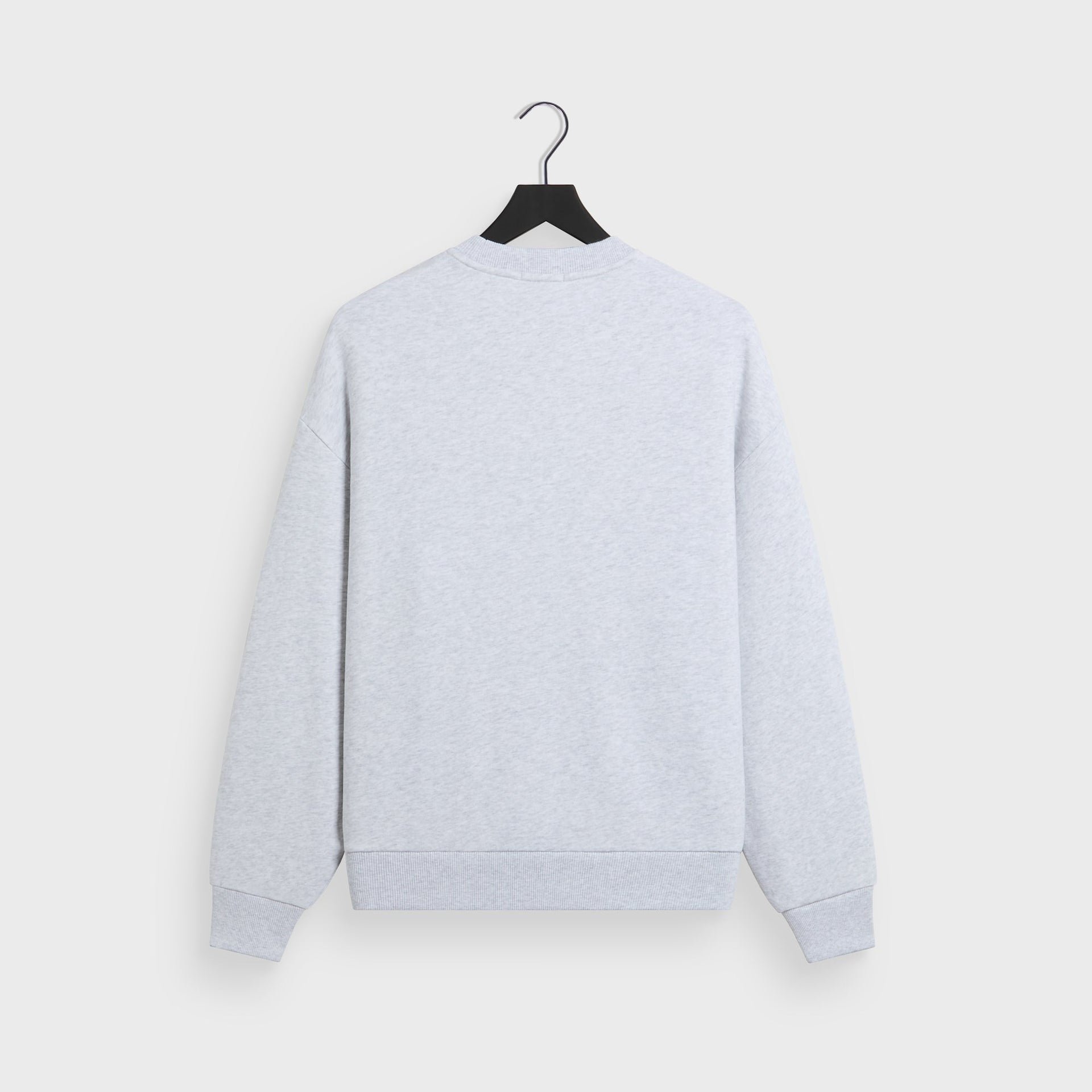 Kith Nelson crewneck in light heather grey cotton fleece, back flat lay on hanger